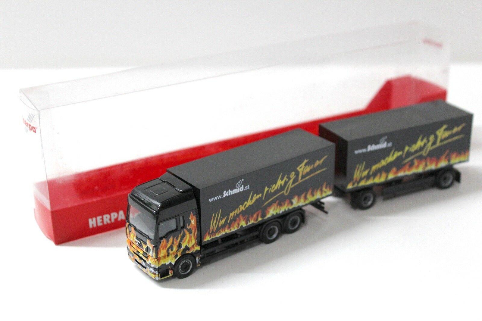 ID 32151 orig.jpg 1:87 Herpa MAN TGA XXL HZ Koffer " SCHMID" flames
