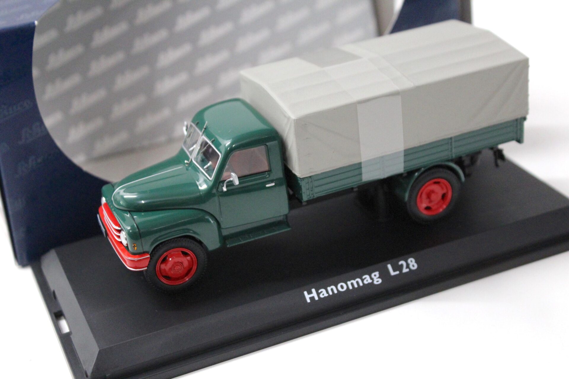 ID 44991 orig 1.jpg 1:43 Schuco Hanomag L28 Pritsche/ Plane green/ grey