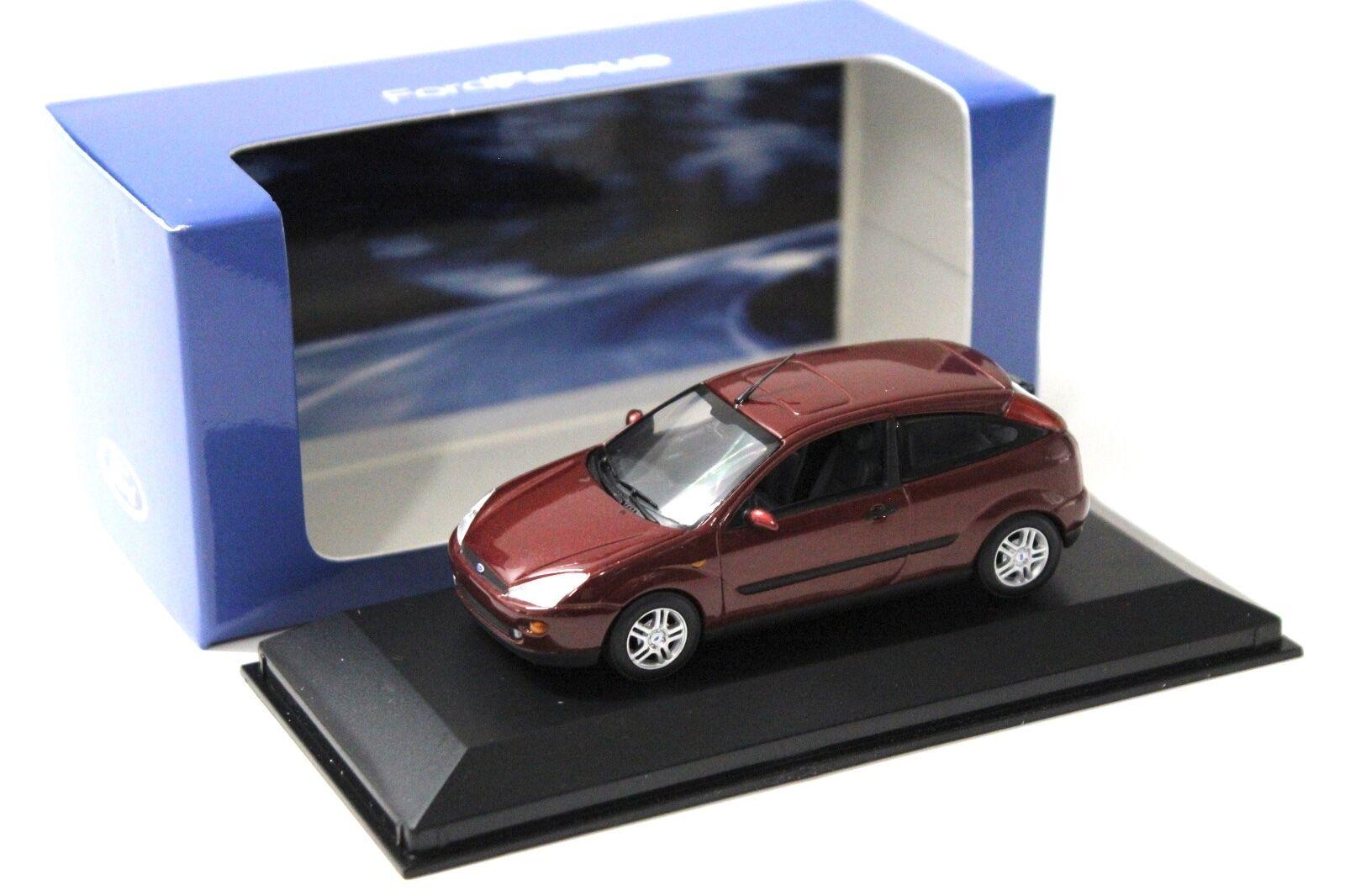 ID 47337 orig.jpg 1:43 Minichamps Ford Focus Ghia 1999 dark red DEALER VERSION
