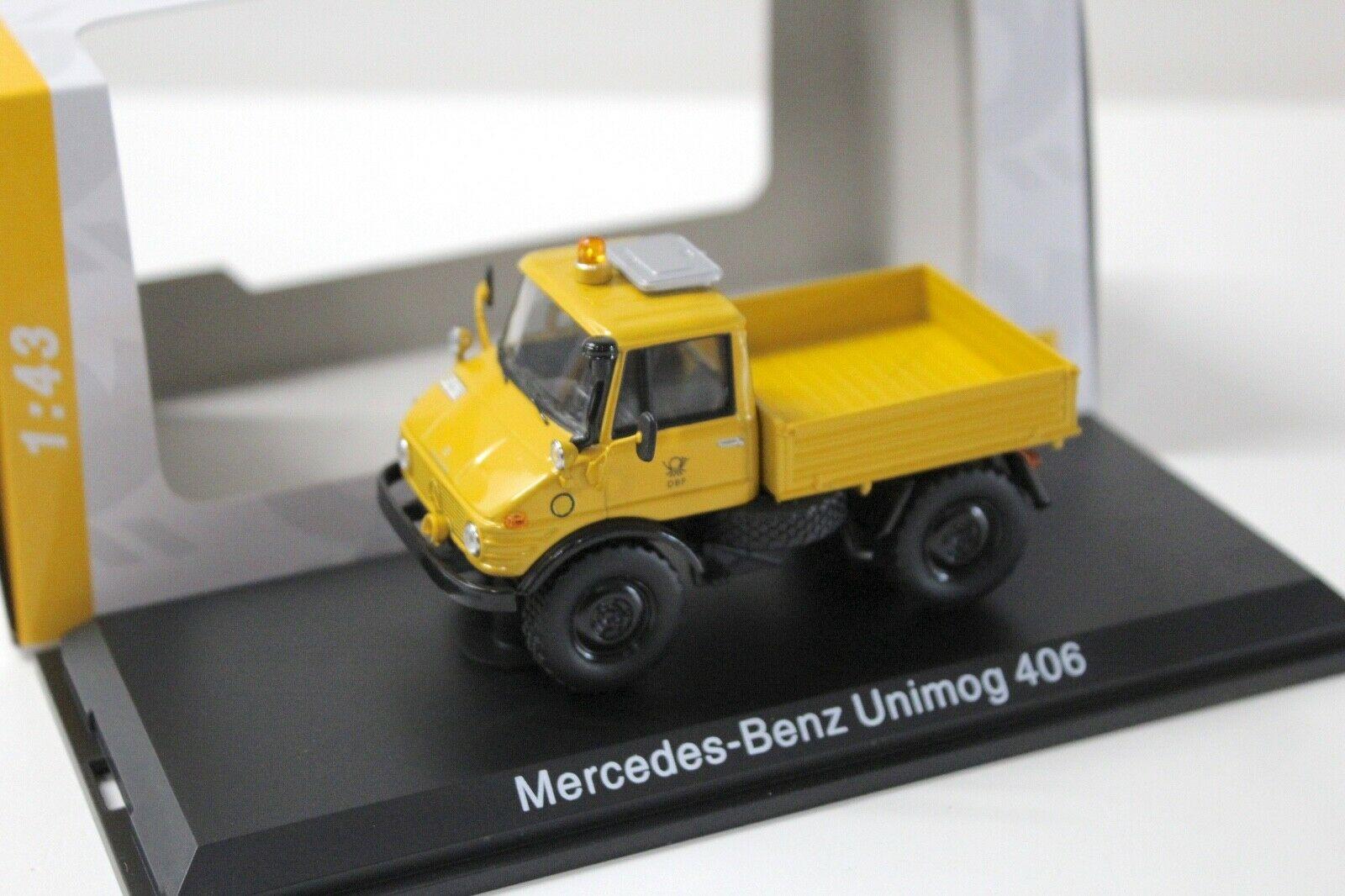 ID 50909 orig 1.jpg 1:43 Schuco Mercedes Unimog 406 yellow DB Post