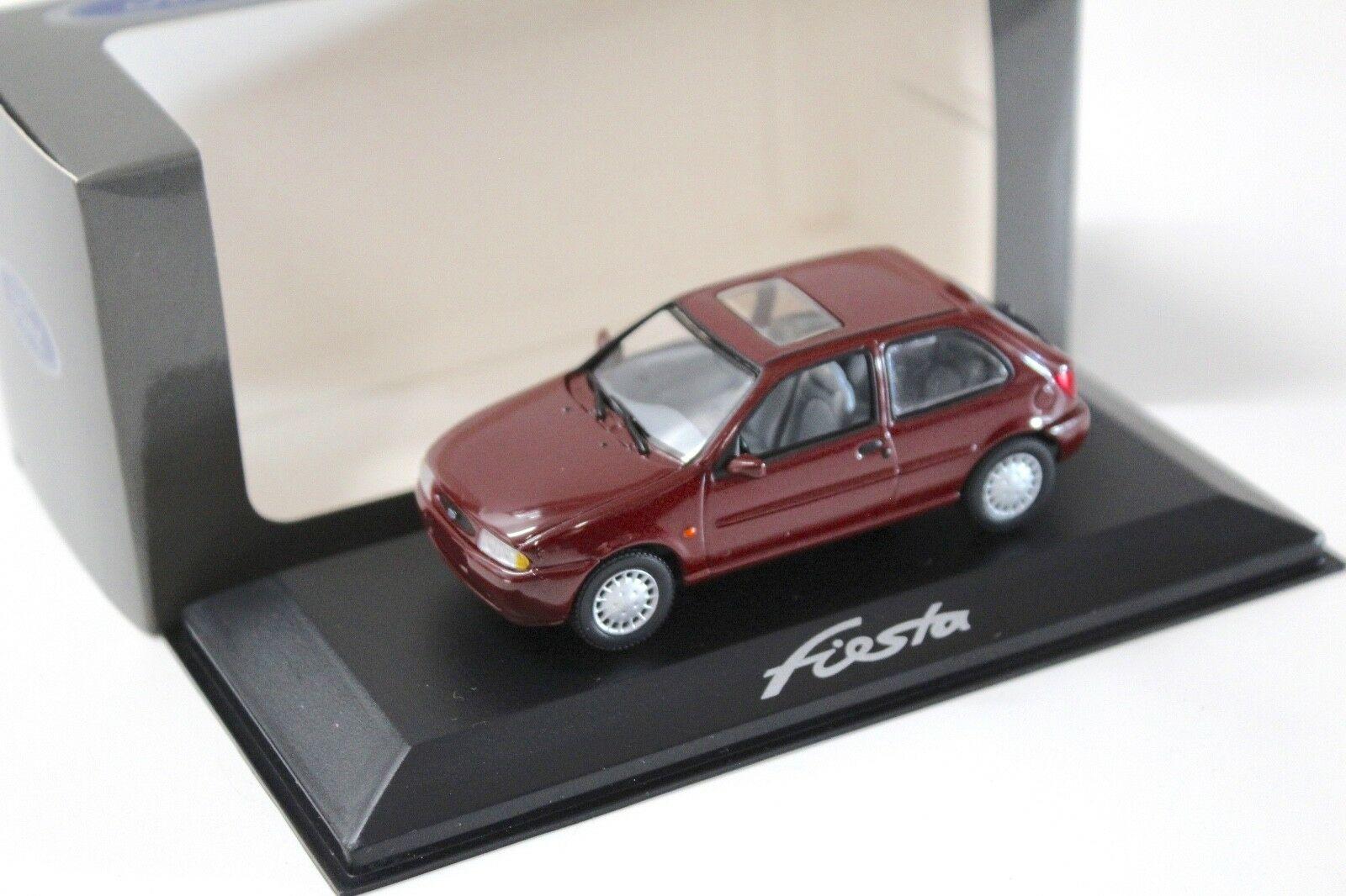 ID 51017 orig 1.jpg 1:43 Minichamps Ford Fiesta Ghia 1996 dark red DEALER VERSION