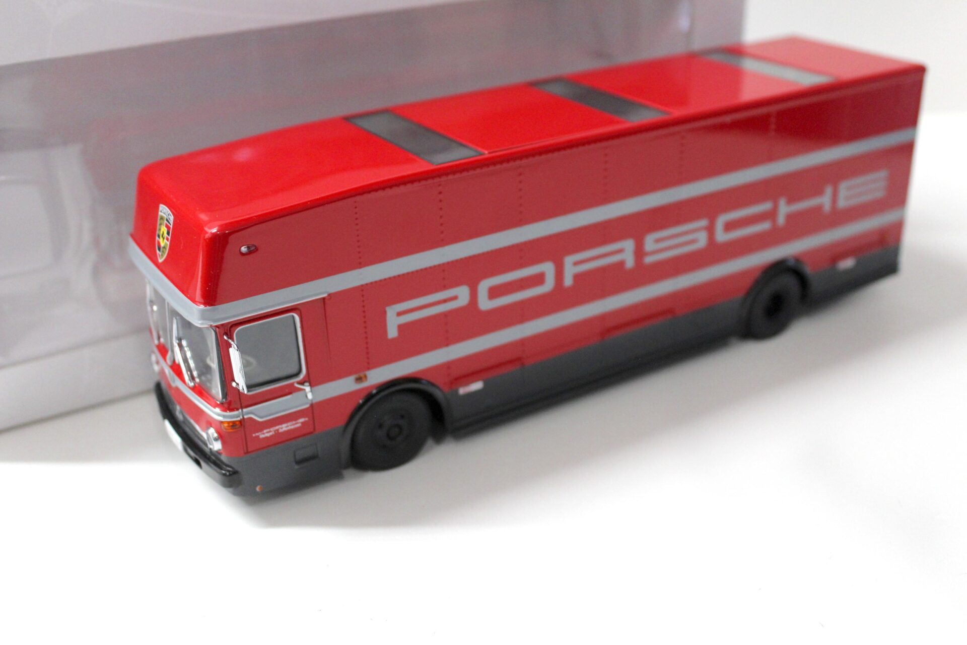 ID 52167 orig 1.jpg 1:43 Premium ClassiXXs Mercedes O317 Renntransporter "PORSCHE" red