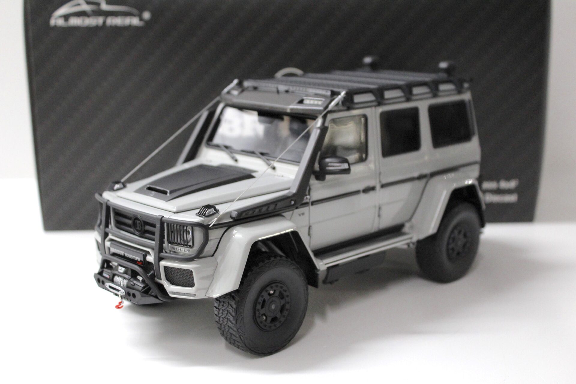 ID 54190 orig 1.jpg 1:18 Almost Real Mercedes G500 4Ã4² Brabus 550 Adventure grey