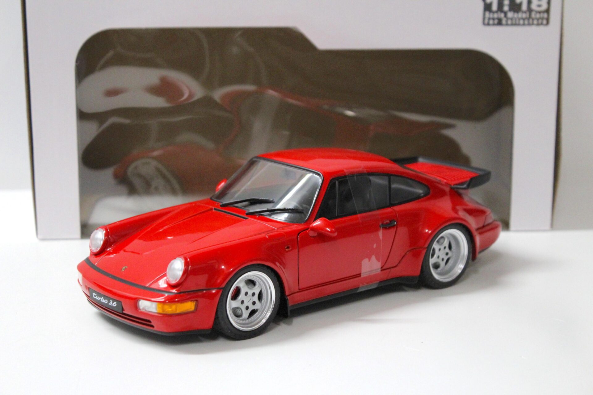 ID 55168 orig 1.jpg 1:18 Solido Porsche 911 (964) Turbo 3.6 Coupe red 1990