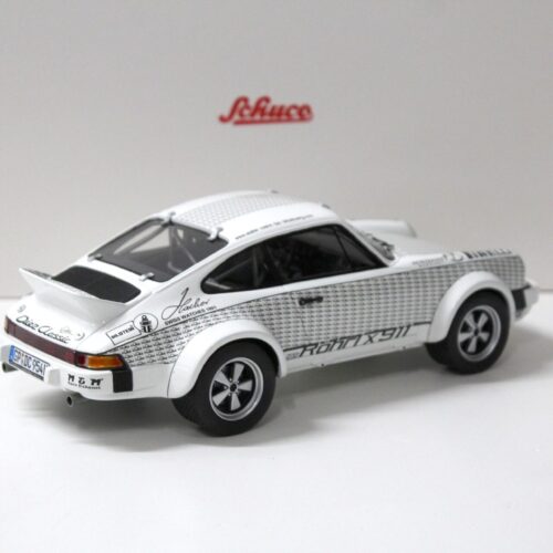 1:18 Schuco Porsche 911 Rallye x911 + Figur Walter Röhrl white/ black