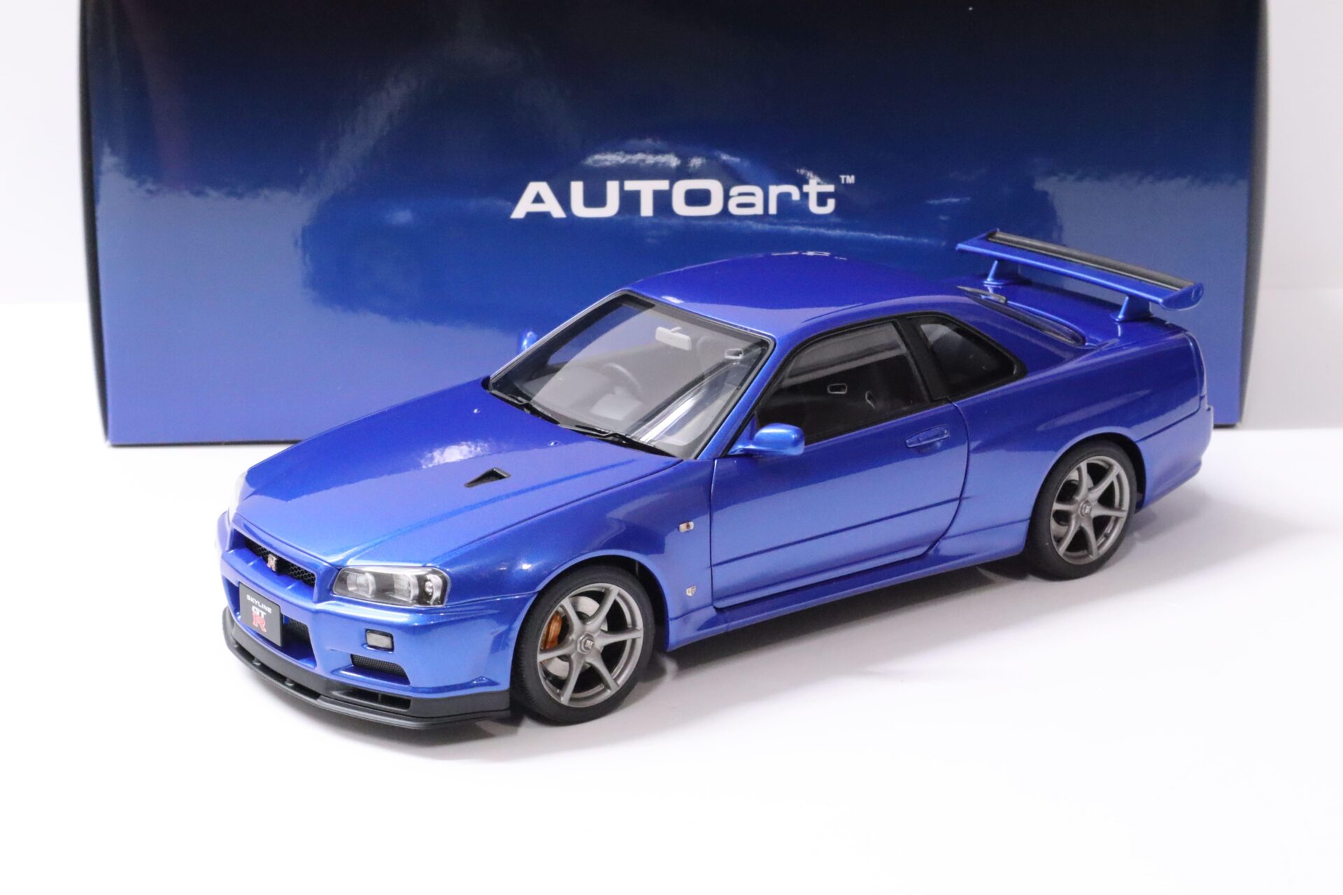ID 58941 orig 1.jpg 1:18 AUTOart Nissan Skyline GT-R (R34) V-SPEC II Bayside blue 2001