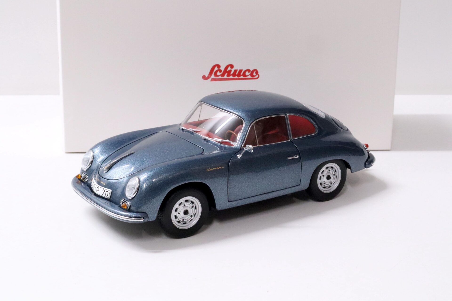 ID 59244 orig 1.jpg 1:18 Schuco Porsche 356 A Carrera Coupe blue metallic "70 Jahre Porsche"