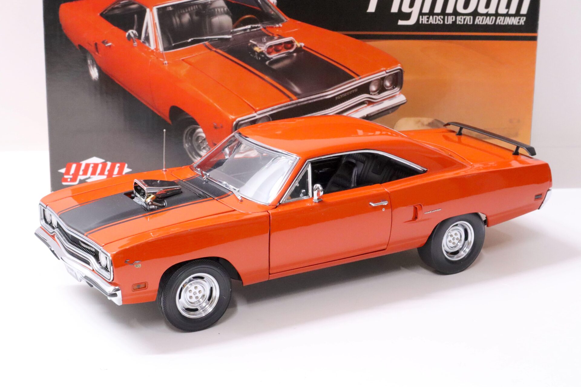 ID 62826 orig 1.jpg 1:18 GMP 1970 Plymouth Road Runner HEADS UP Street Machine orange