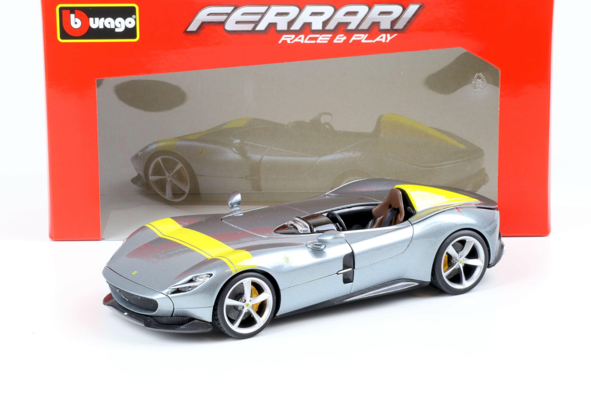 ID 63810 orig 1.jpg 1:18 Bburago R&P Ferrari Monza SP1 grey metallic/ yellow 2019