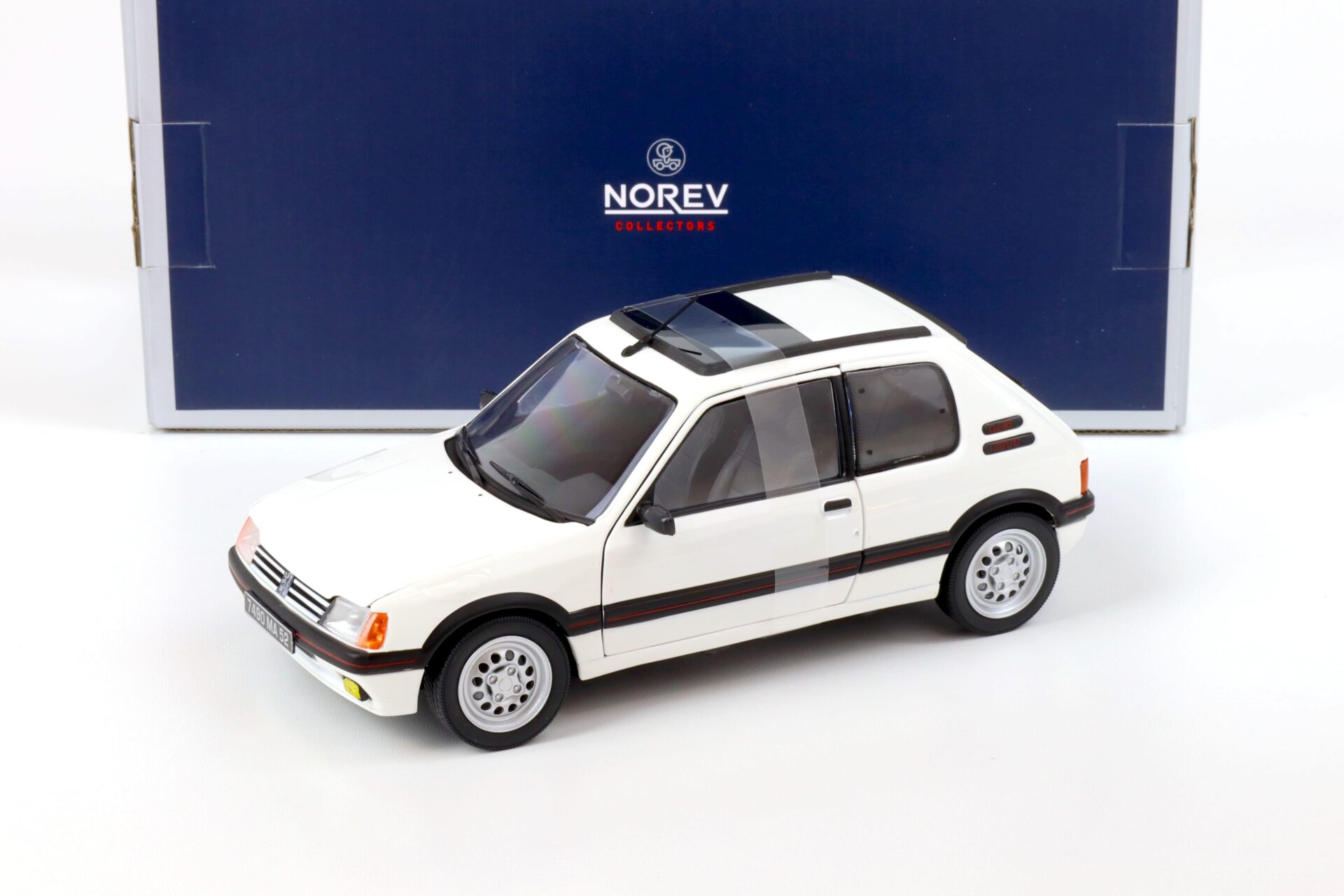 ID 68527 orig.jpg 1:18 Norev Peugeot 205 GTi 1.6 white 1988