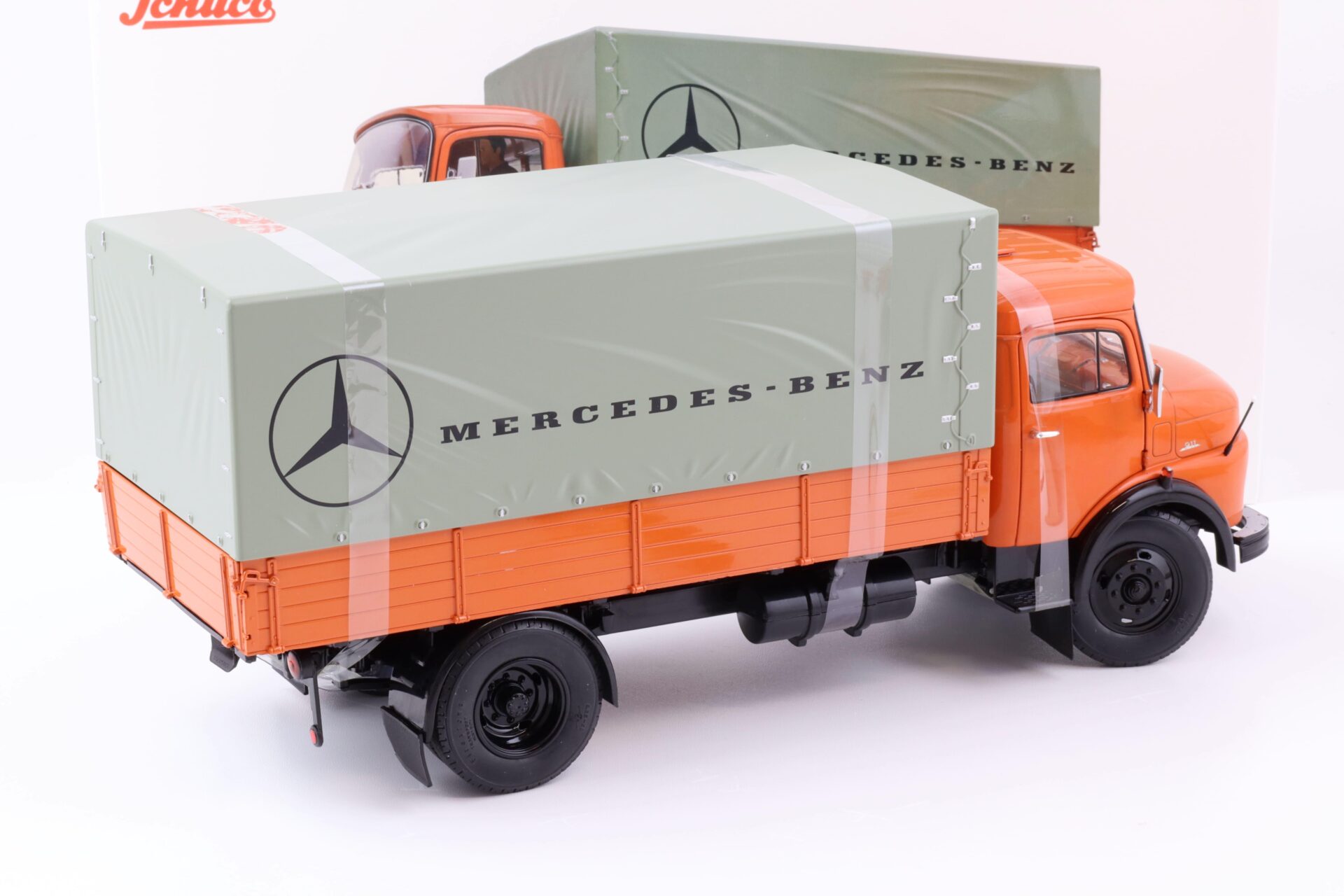 1:18 Schuco Mercedes L911 Pritsche + Plane LKW MHI Edition orange Die-Cast