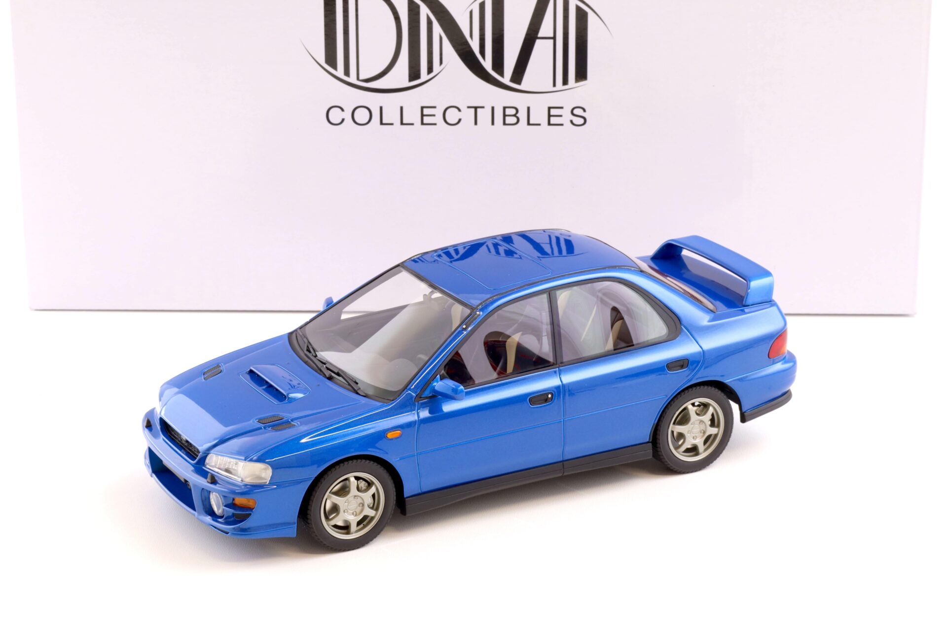 ID 72606 orig 1.jpg 1:18 DNA Collectibles Subaru Impreza GT Turbo 2000 blue metallic