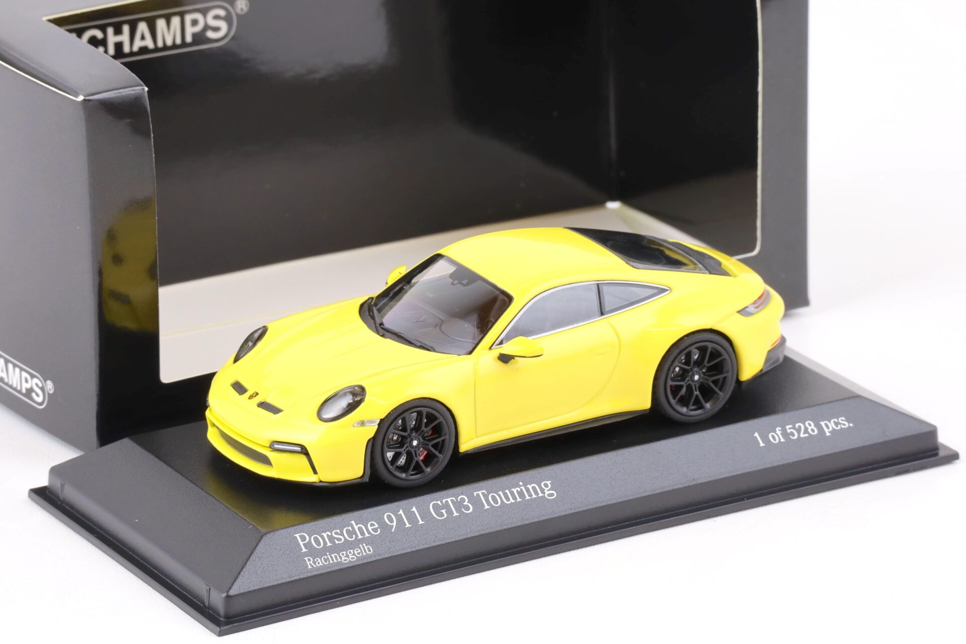 ID 74756 orig.jpg 1:43 Minichamps Porsche 911 (992) GT3 Touring 2021 Racing yellow/ black wheels