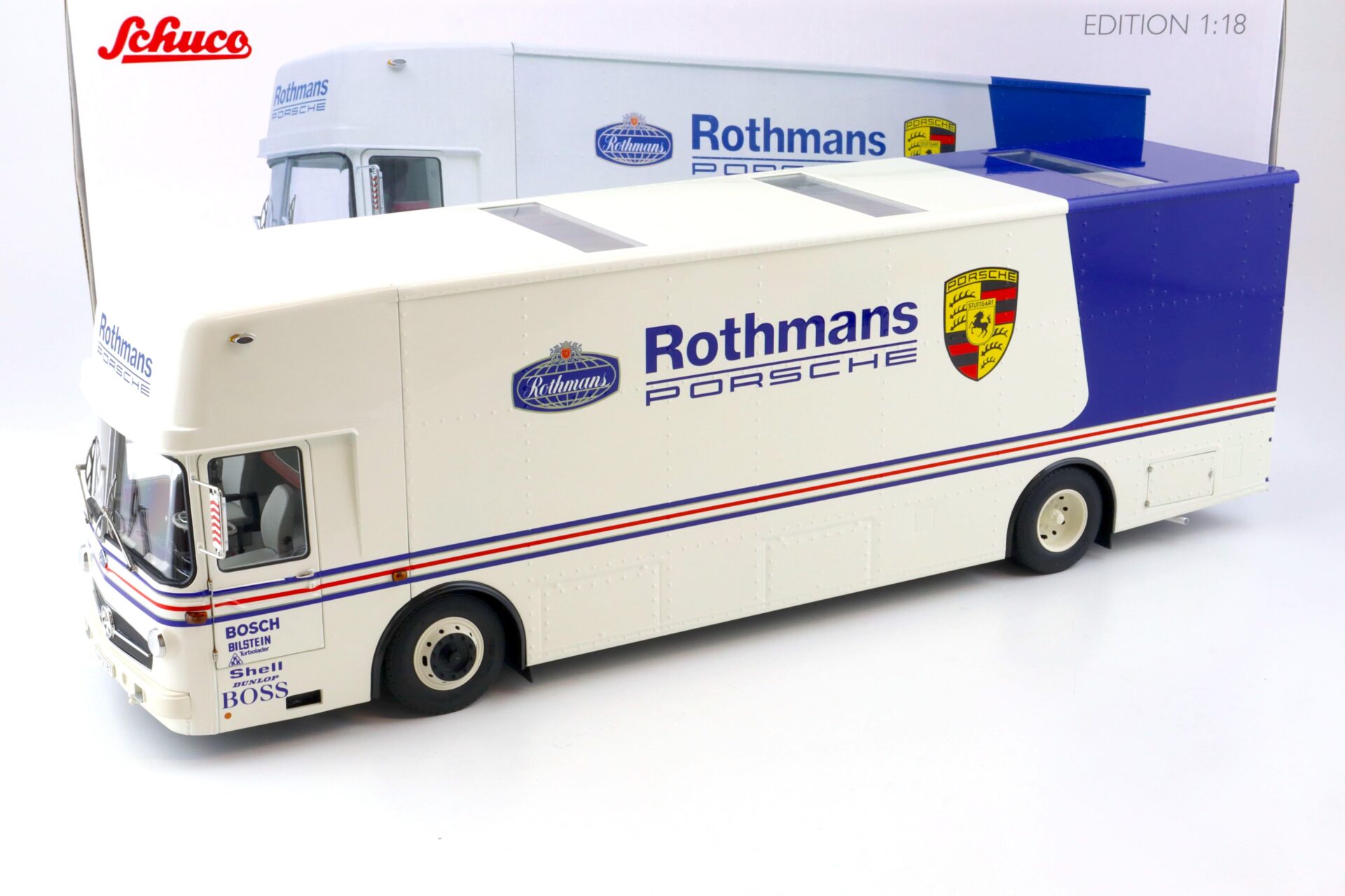 ID 80763 orig 1.jpg 1:18 Schuco Mercedes O317 Renntransporter ROTHMANS PORSCHE white/ blue