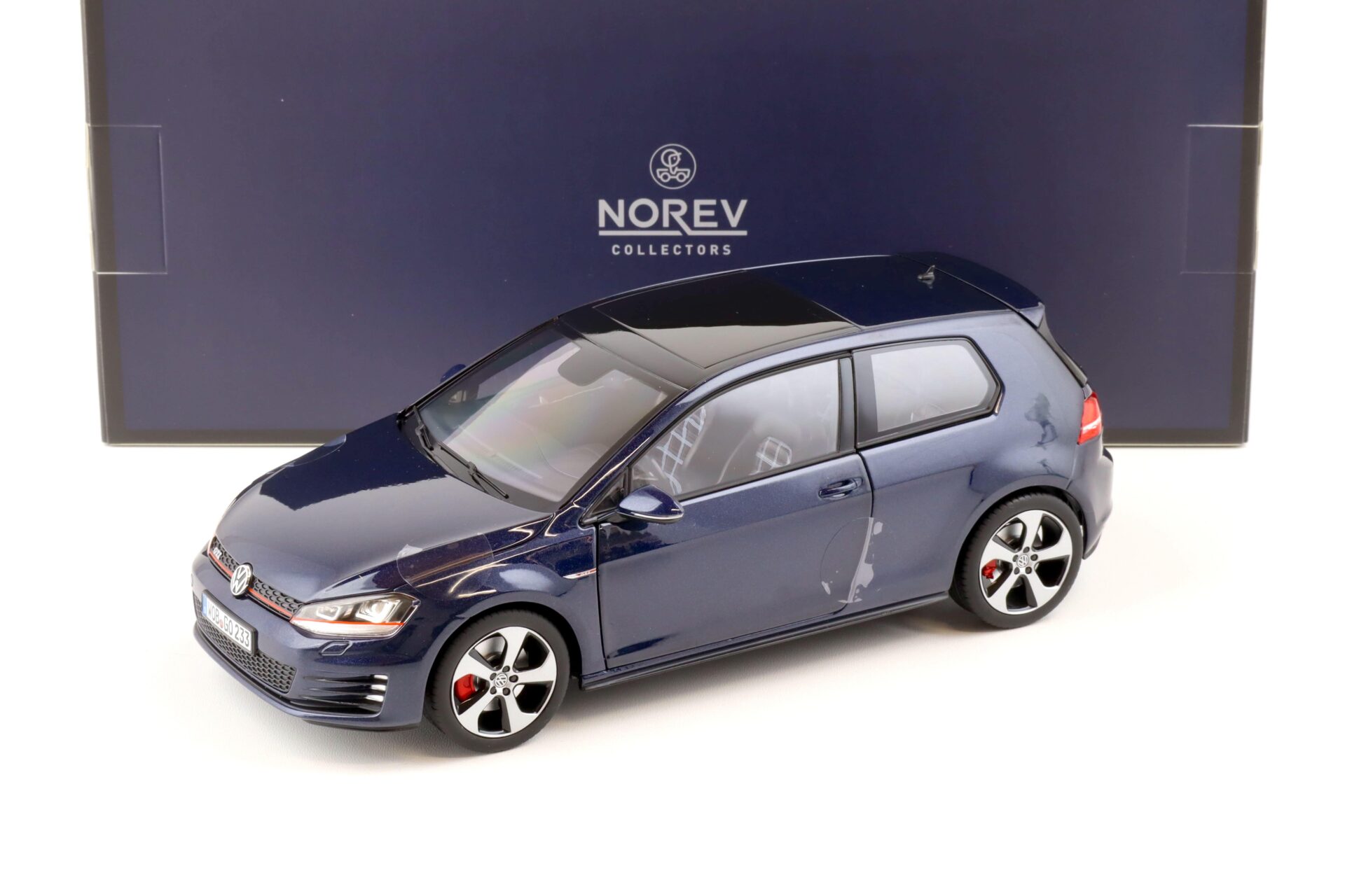 ID 82576 orig 1.jpg 1:18 Norev VW Golf VII 7 GTI 2013 night blue metallic - Limited 200 pcs.
