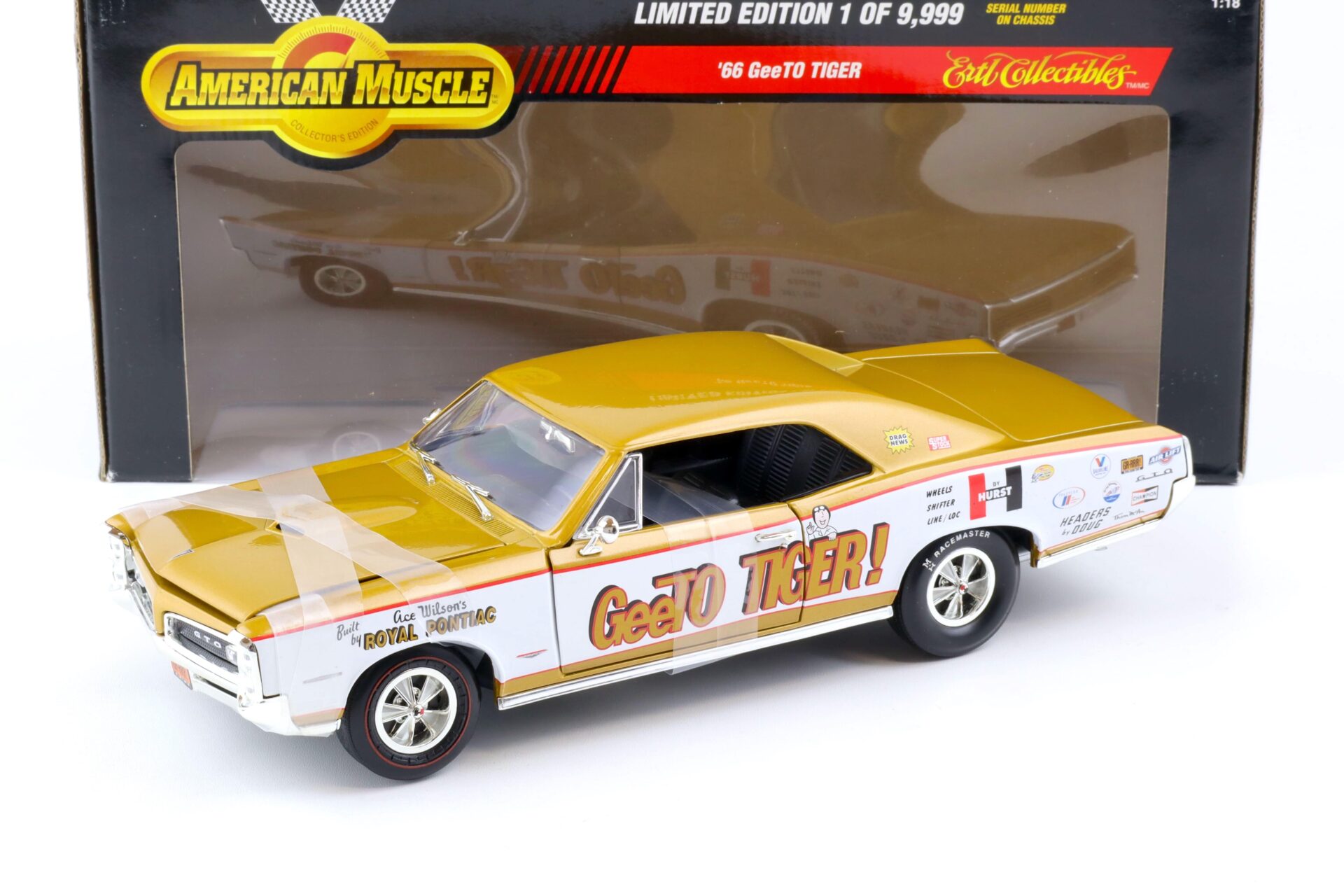 ID 82779 orig.jpg 1:18 ERTL 1966 Pontiac GTO Coupe GeeTO Tiger gold metallic/ white