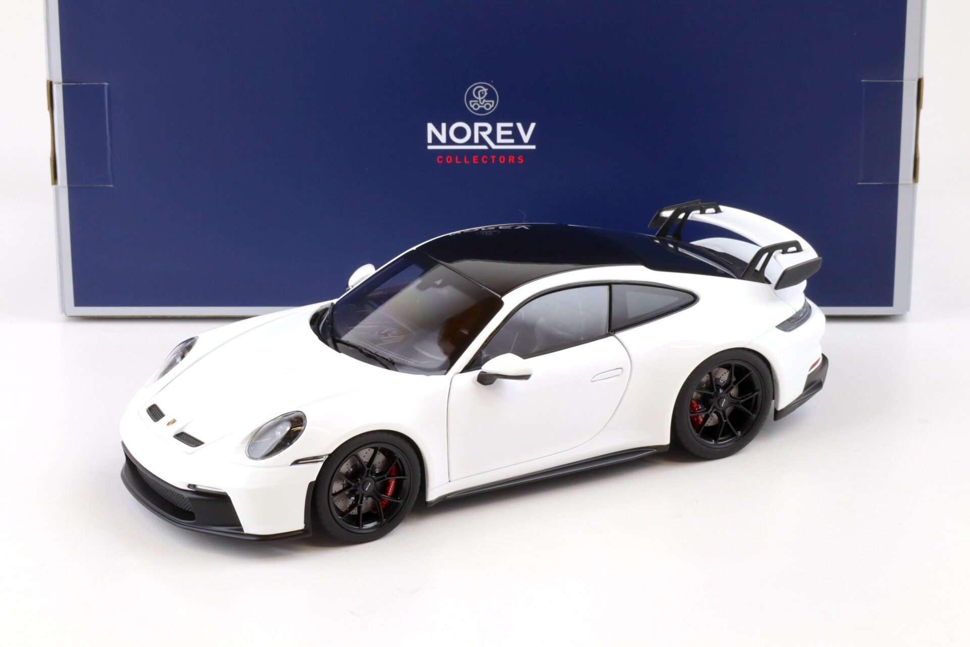 ID 83285 orig.jpg 1:18 Norev Porsche 911 (992) GT3 Coupe 2021 white/ black roof