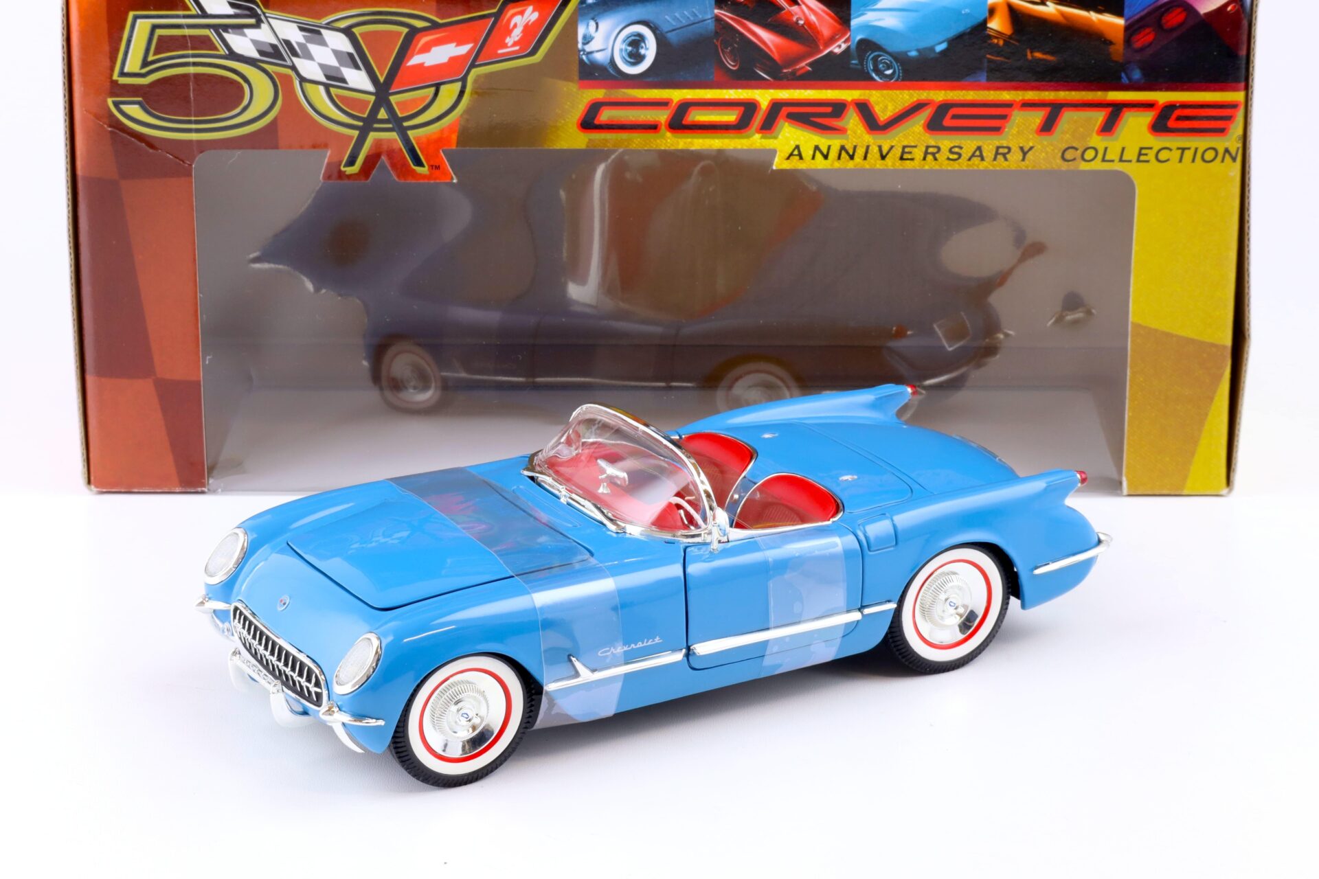 ID 84222 orig 1.jpg 1:18 ERTL 1954 Chevrolet Corvette Convertible blue/ red Anniversary Collection