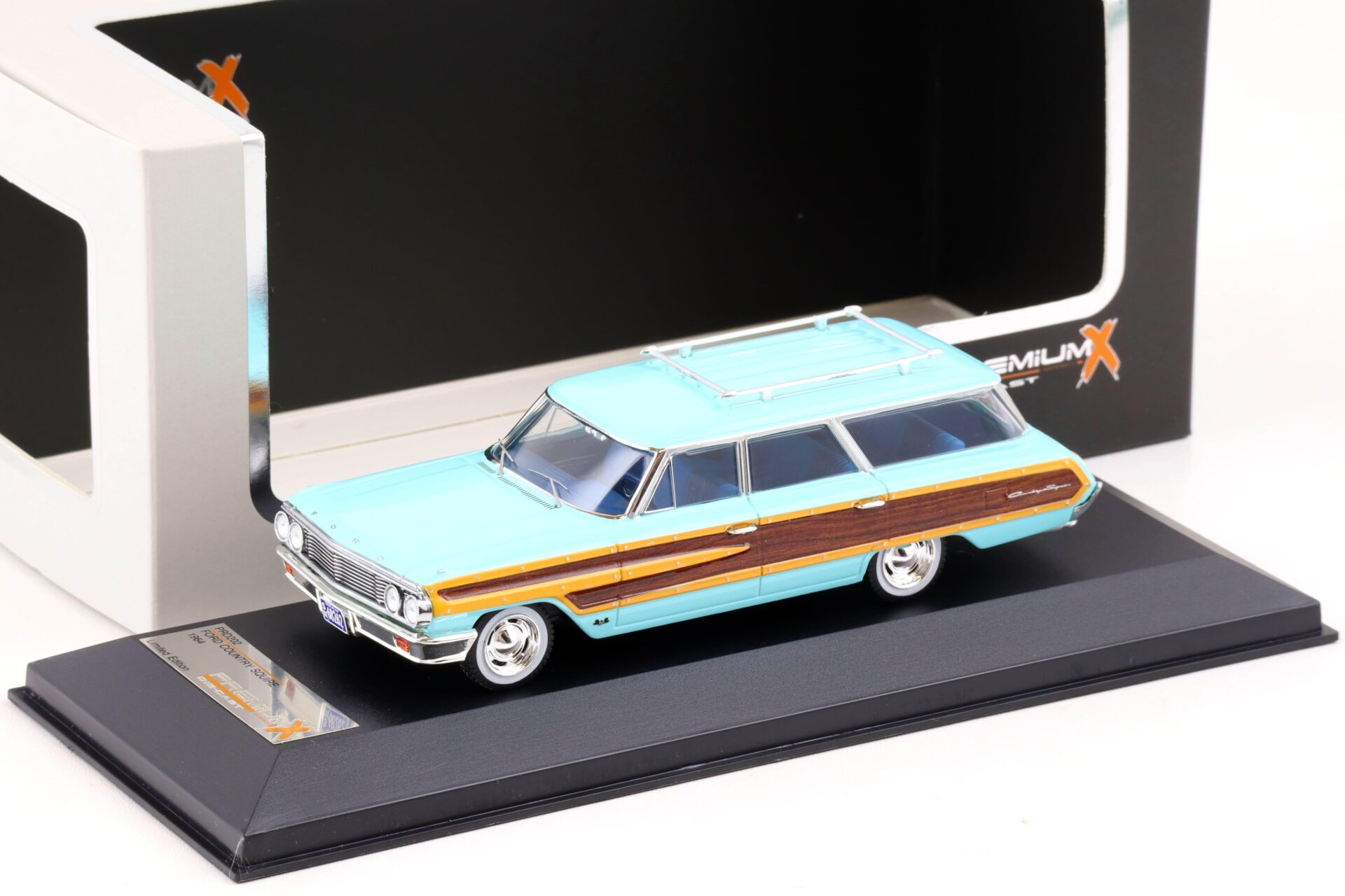ID 84537 orig.jpg 1:43 PremiumX Ford Country Squire 1964 light blue/ wood panels