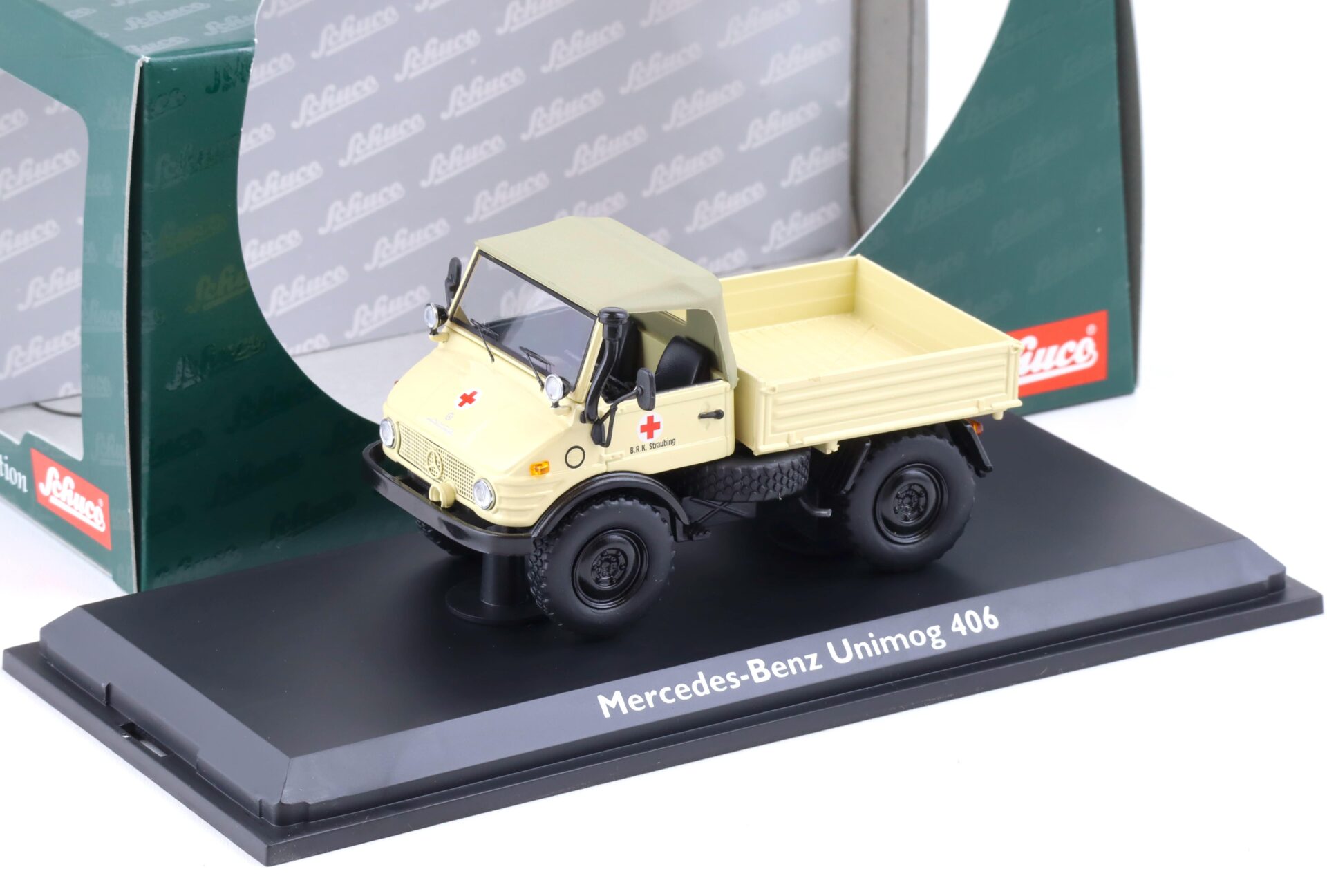 ID 84555 orig 1.jpg 1:43 Schuco Mercedes Unimog 406 BRK Straubing beige