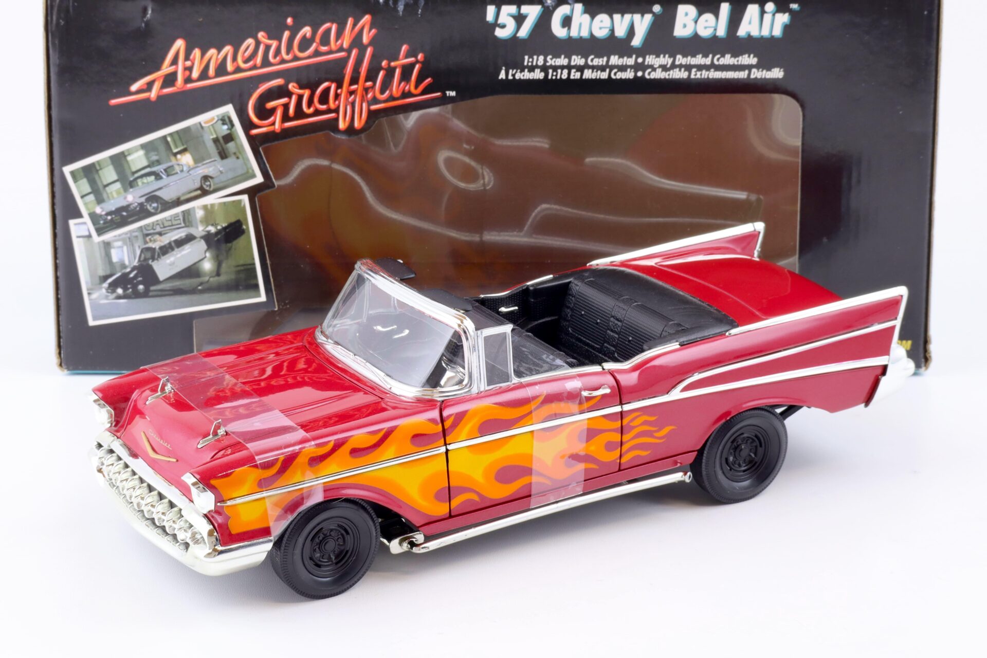 ID 86630 orig.jpg 1:18 ERTL 1957 Chevrolet Bel Air Convertible American Graffiti red/ with flames