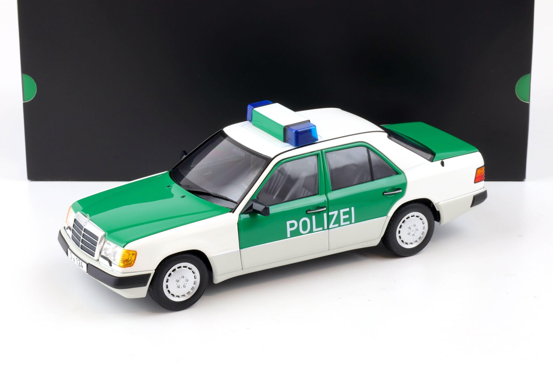 ID 87735 orig.jpg 1:18 Norev Mercedes 230 E W124 Limousine 1992 POLIZEI white/ green DEALER VERSION