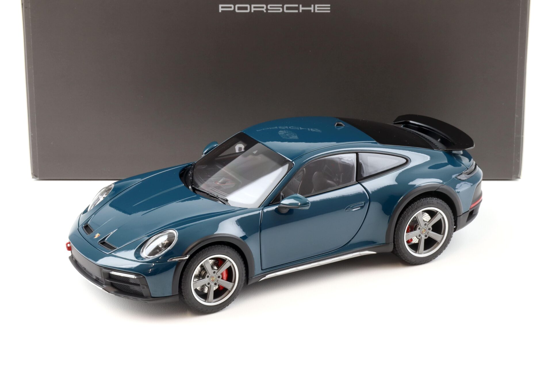 ID 93402 orig 1.jpg 1:18 Norev Porsche 911 (992) Dakar Coupe 2023 Fjord green WAP DEALER