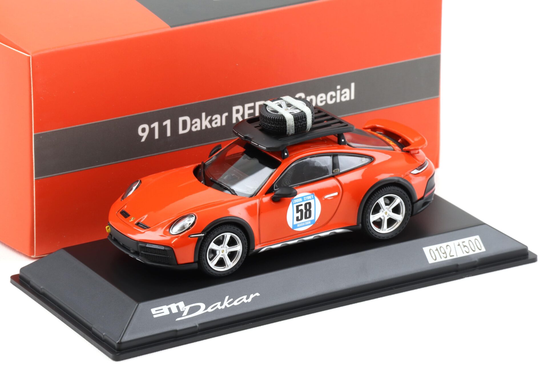 ID 95051 orig 1.jpg 1:43 Spark Porsche 911 (992) Dakar RED58 Special orange Limited WAP DEALER