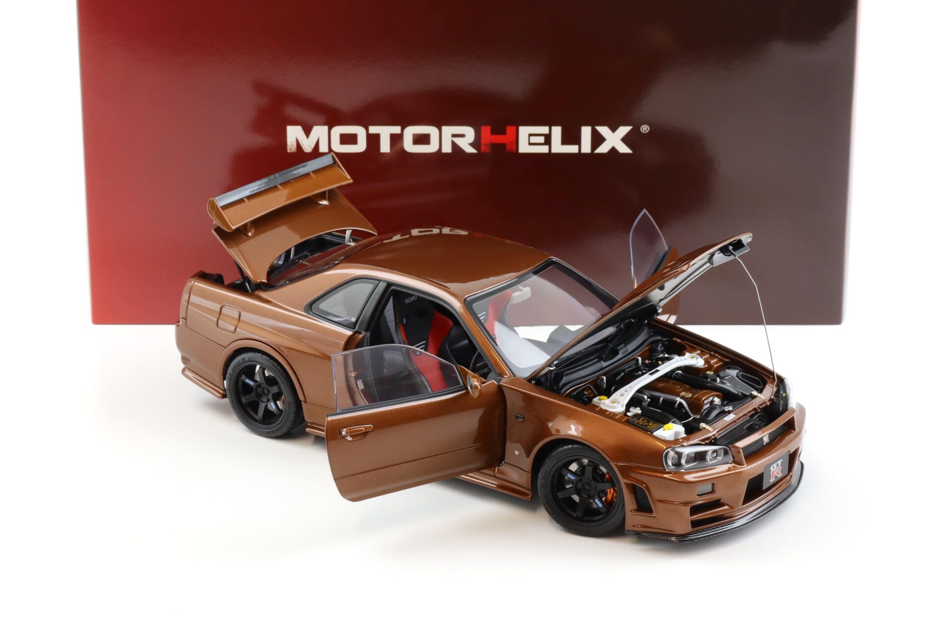 1:18 Motorhelix Nissan Skyline R34 Customized metallic bronze M83414