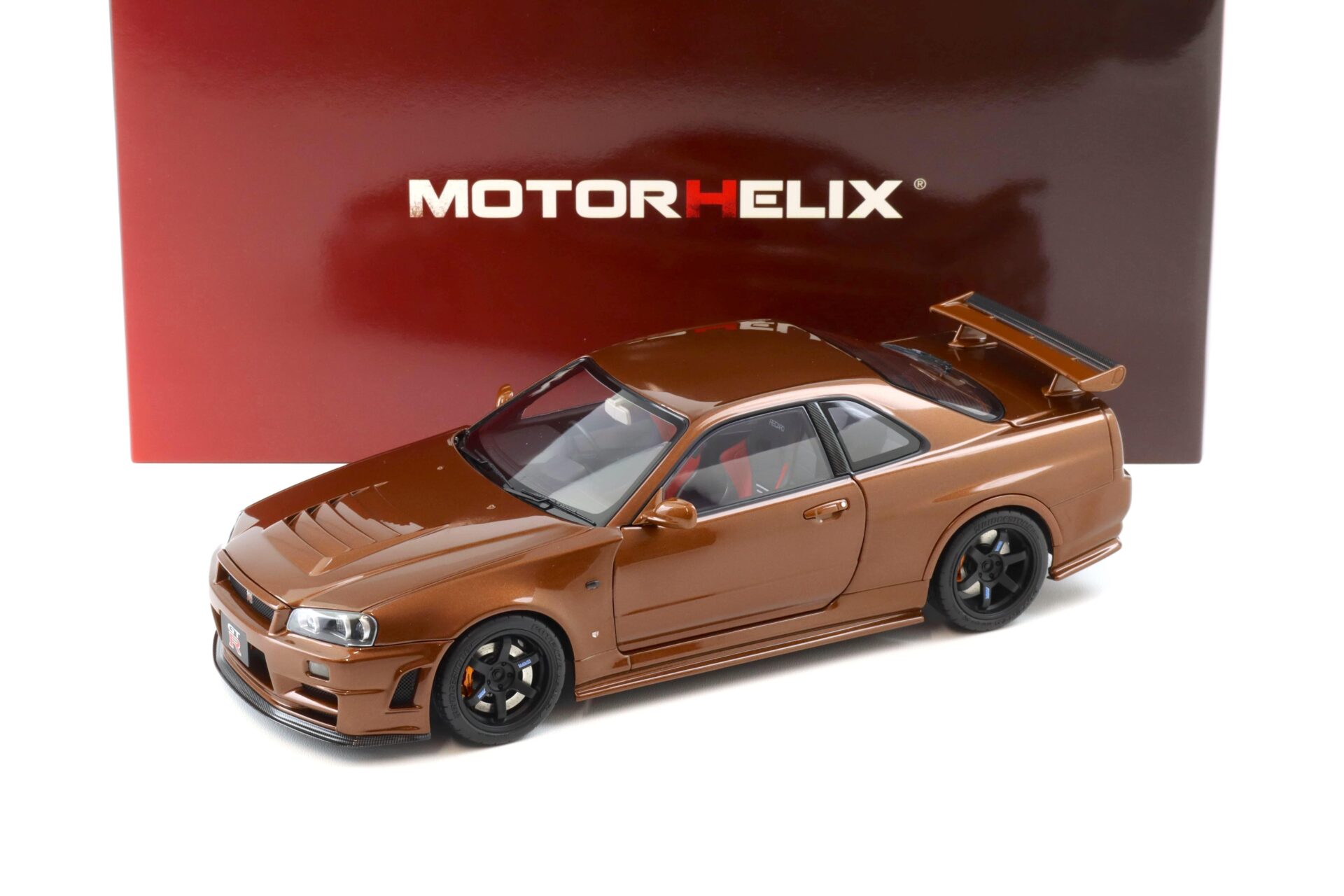 ID 103862 orig 1.jpg 1:18 Motorhelix Nissan Skyline R34 Customized metallic bronze M83414