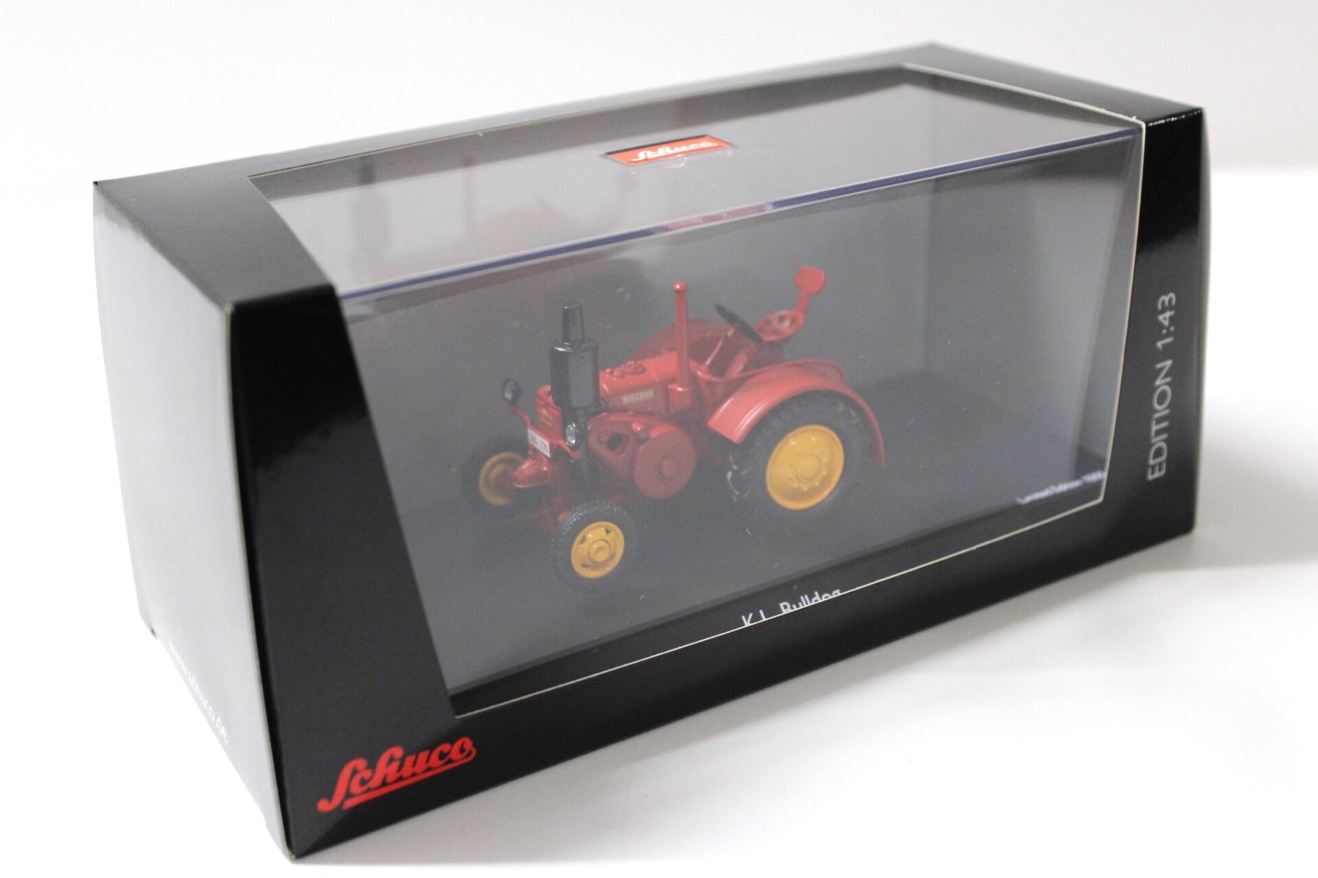 1:43 Schuco K.L. Bulldog Traktor red