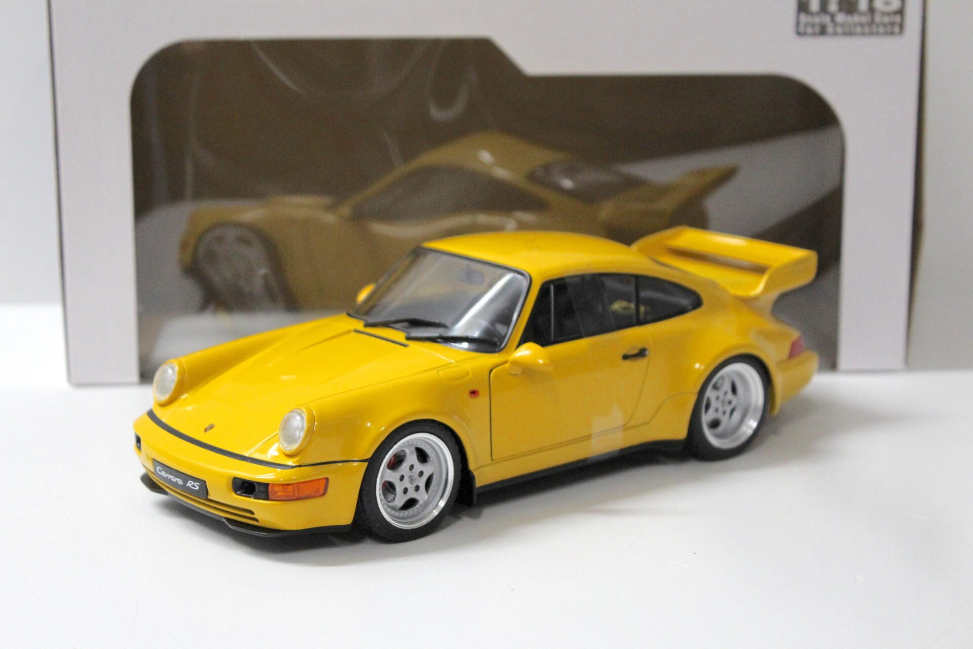 1:18 Solido Porsche 911 (964) Carrera RS 3.8 Coupe yellow 1990