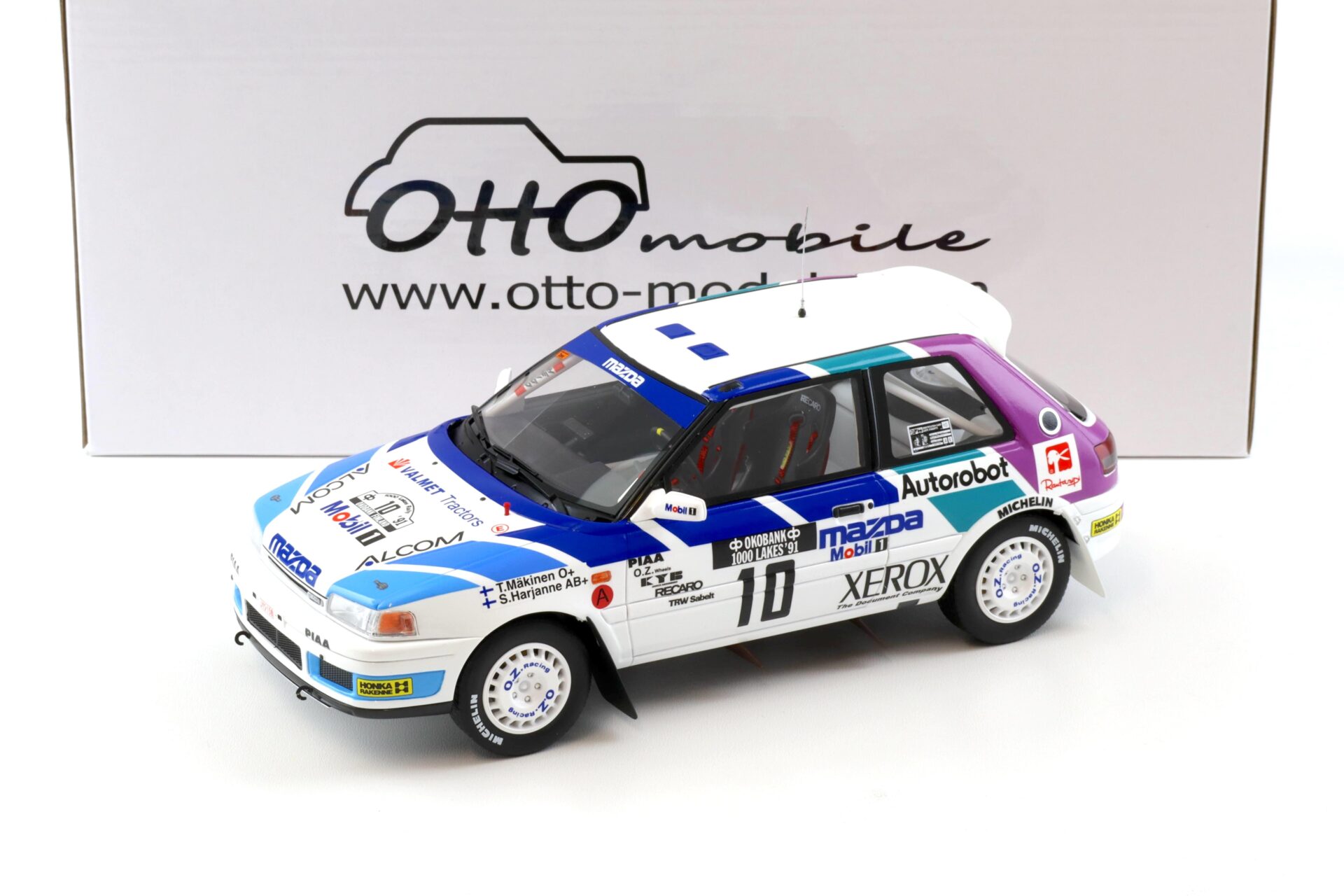 1:18 OTTO mobile OT1099 Mazda 323 GTX Gr.A 1000 Lakes Rally 1991 Maekinen #10