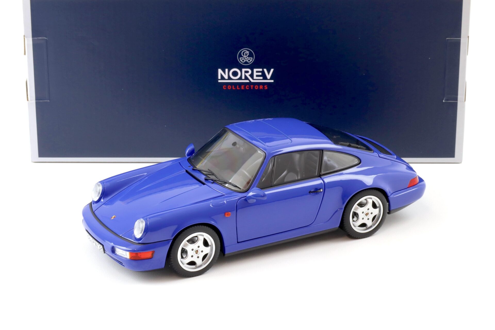 ID 100020 orig.jpg 1:18 Norev Porsche 911 (964) Carrera 4 Coupe 1990 Maritim blue - Limited 504 pcs.