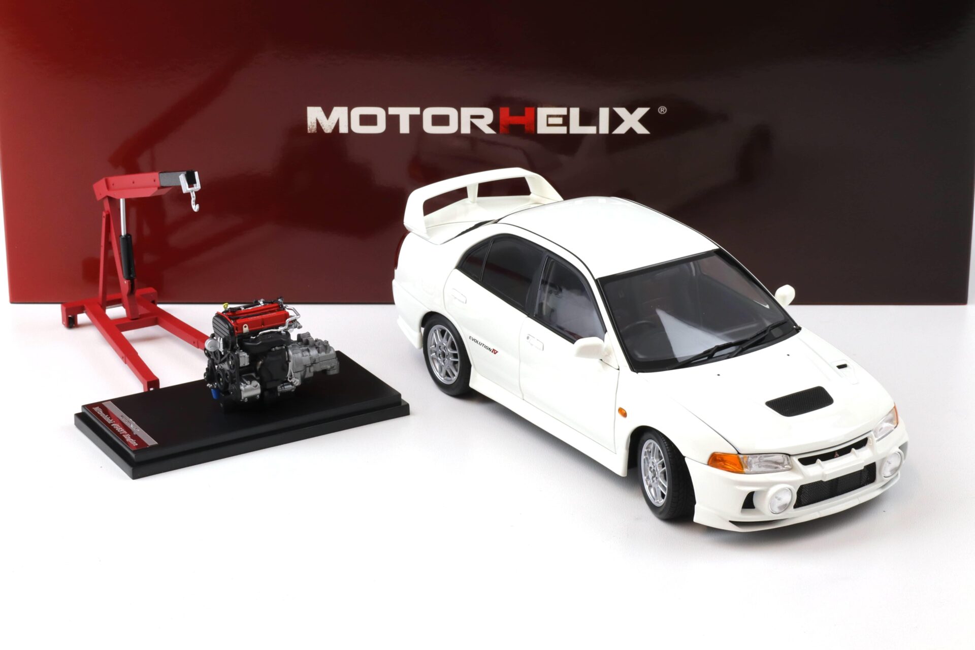 1:18 Motorhelix Mitsubishi Lancer EVO 4 IV Scotia white 1999 with engine M84003