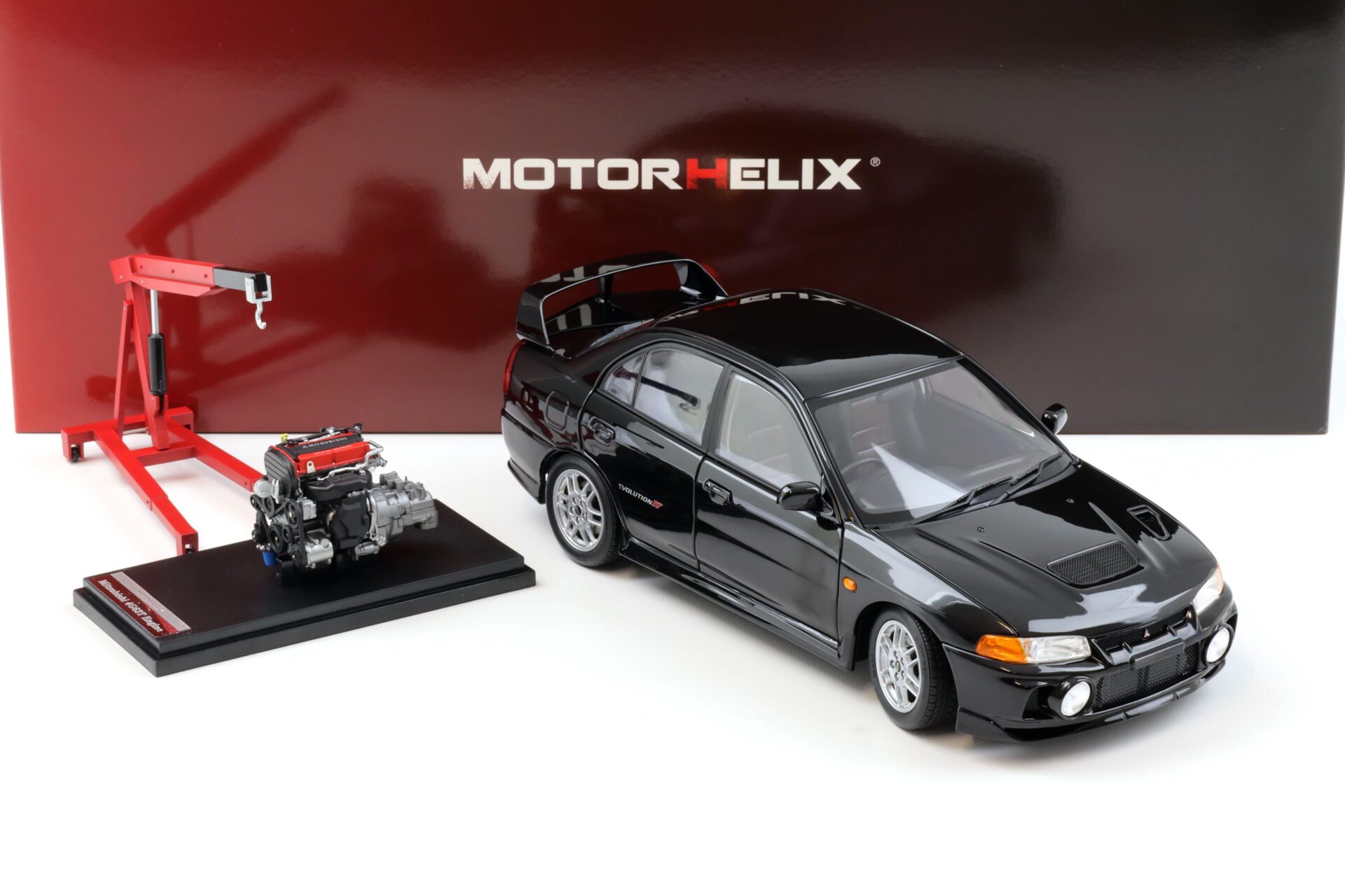 1:18 Motorhelix Mitsubishi Lancer EVO 4 IV Pyreness black 1999 with engine M84002
