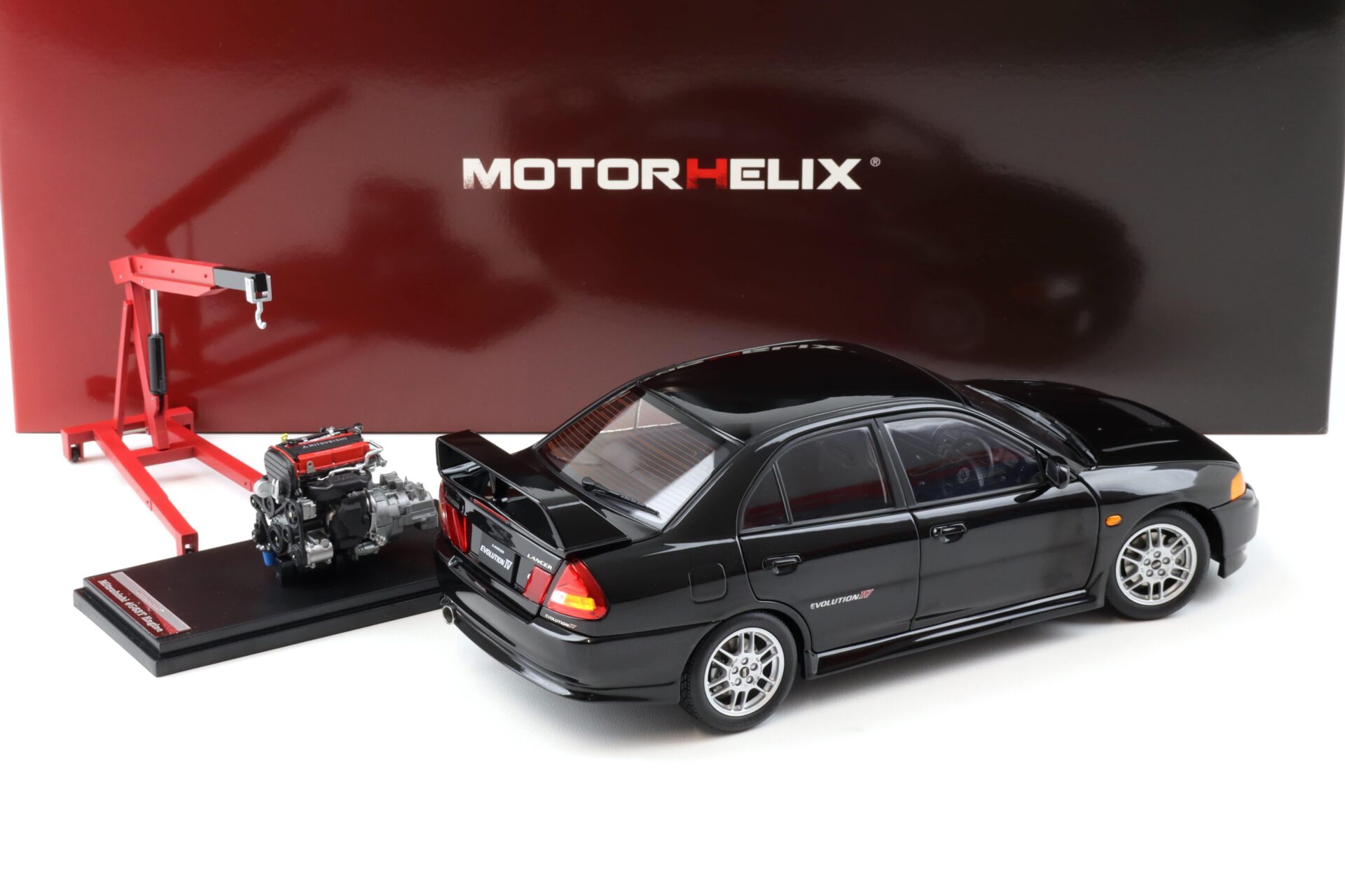 1:18 Motorhelix Mitsubishi Lancer EVO 4 IV Pyreness black 1999 with engine M84002