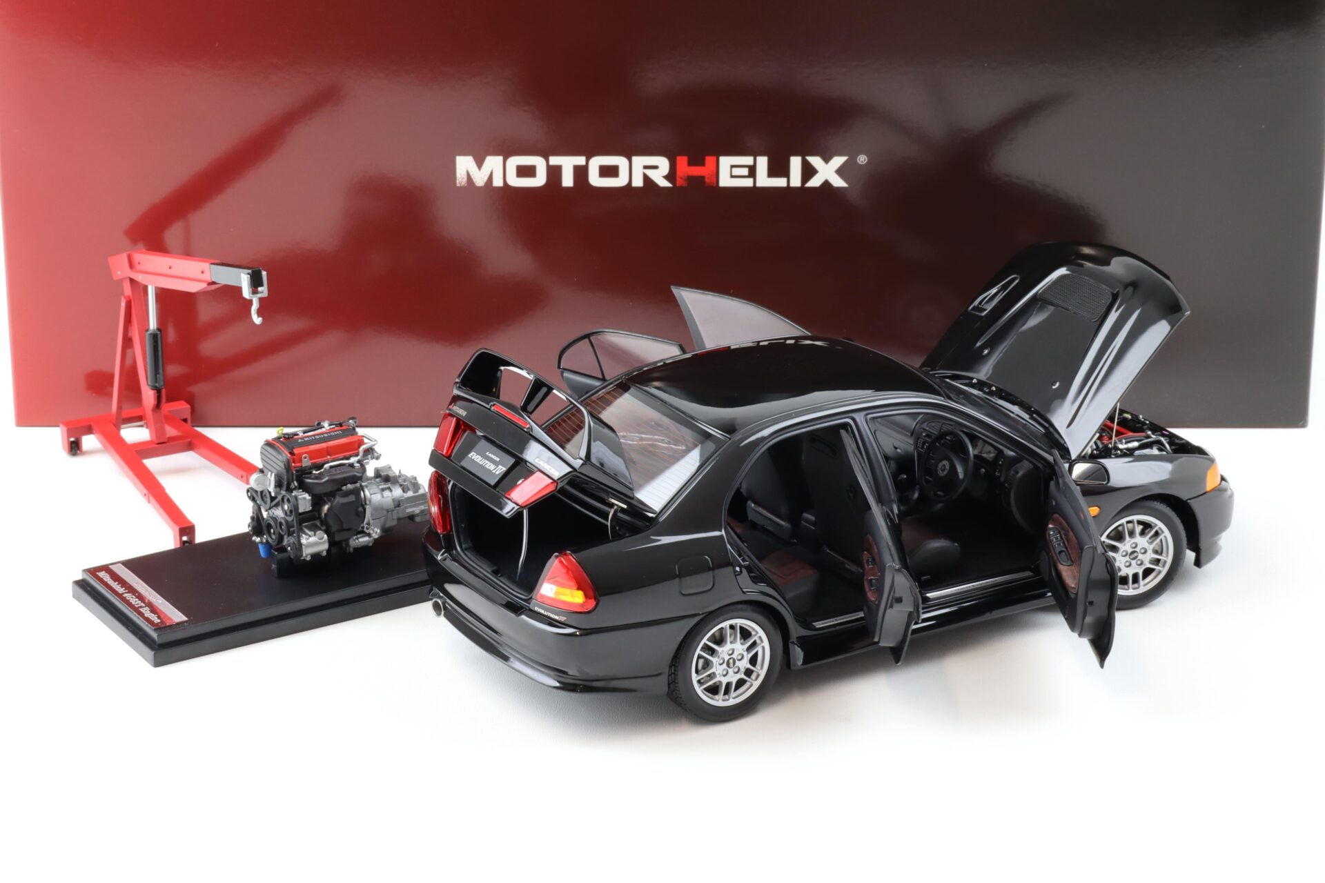 1:18 Motorhelix Mitsubishi Lancer EVO 4 IV Pyreness black 1999 with engine M84002