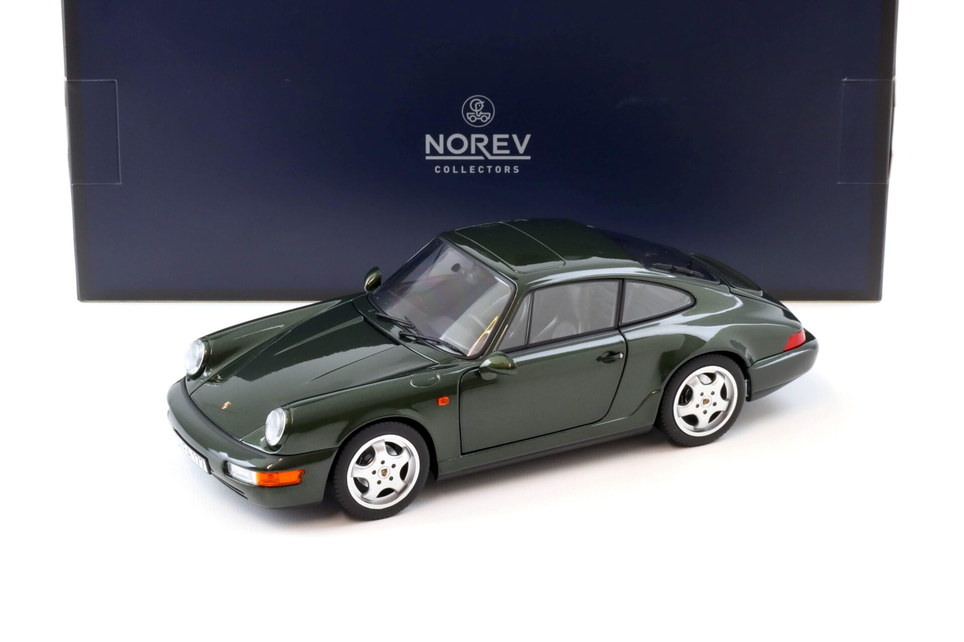 ID 102175 orig.jpg 1:18 Norev Porsche 911 (964) Carrera 4 Coupe 1992 green metallic - Limited 200 pcs.