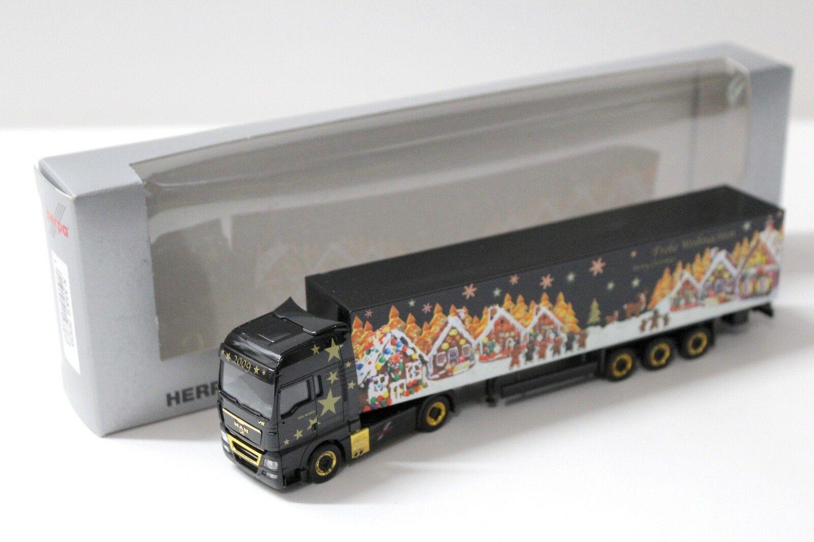 ID 32157 orig.jpg 1:87 Herpa MAN TGX XXL Koffer-SZ "Weihnachten 2009"