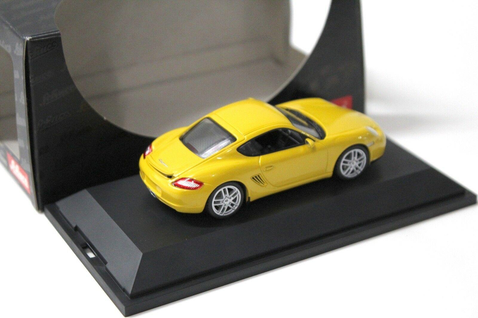 1:43 Schuco Porsche Cayman yellow