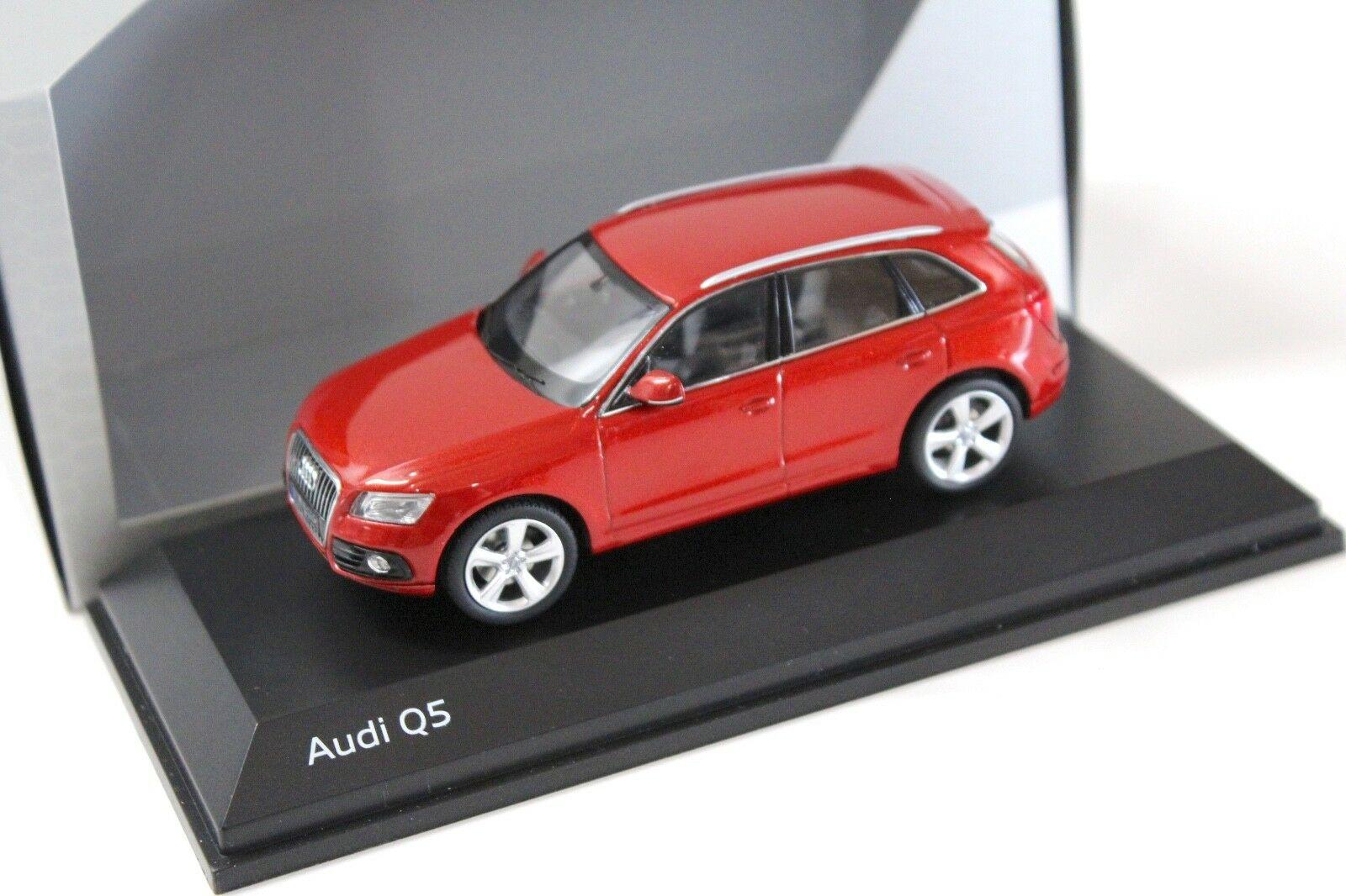 ID 34987 orig.jpg 1:43 Schuco Audi Q5 Vulkan red SUV DEALER VERSION