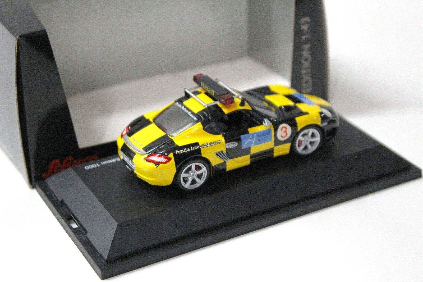 1:43 Schuco Porsche Cayman S "FOLLOW ME" Airport Hannover