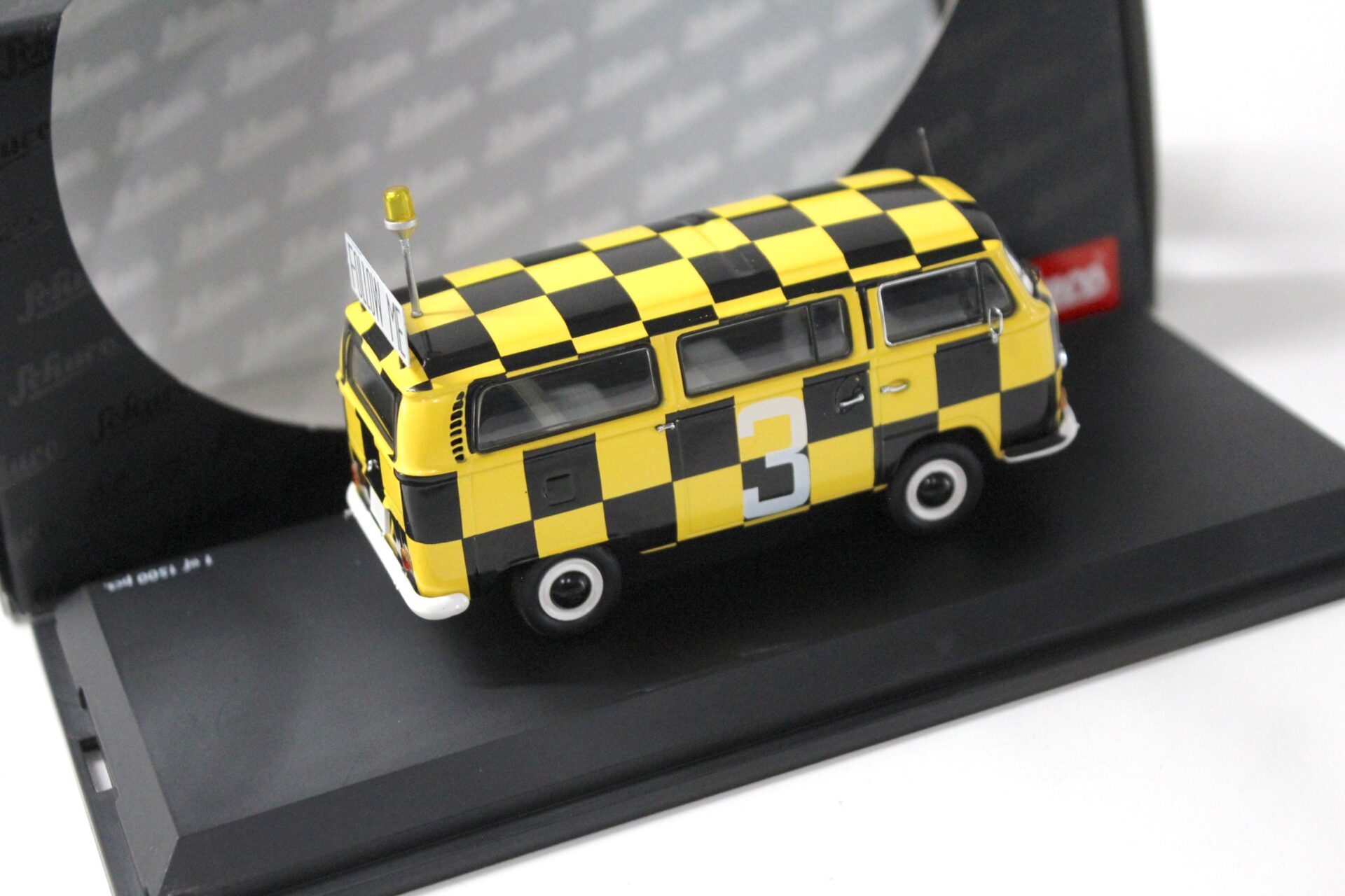 1:43 Schuco VW Bus T2a FOLLOW ME black/ yellow #3