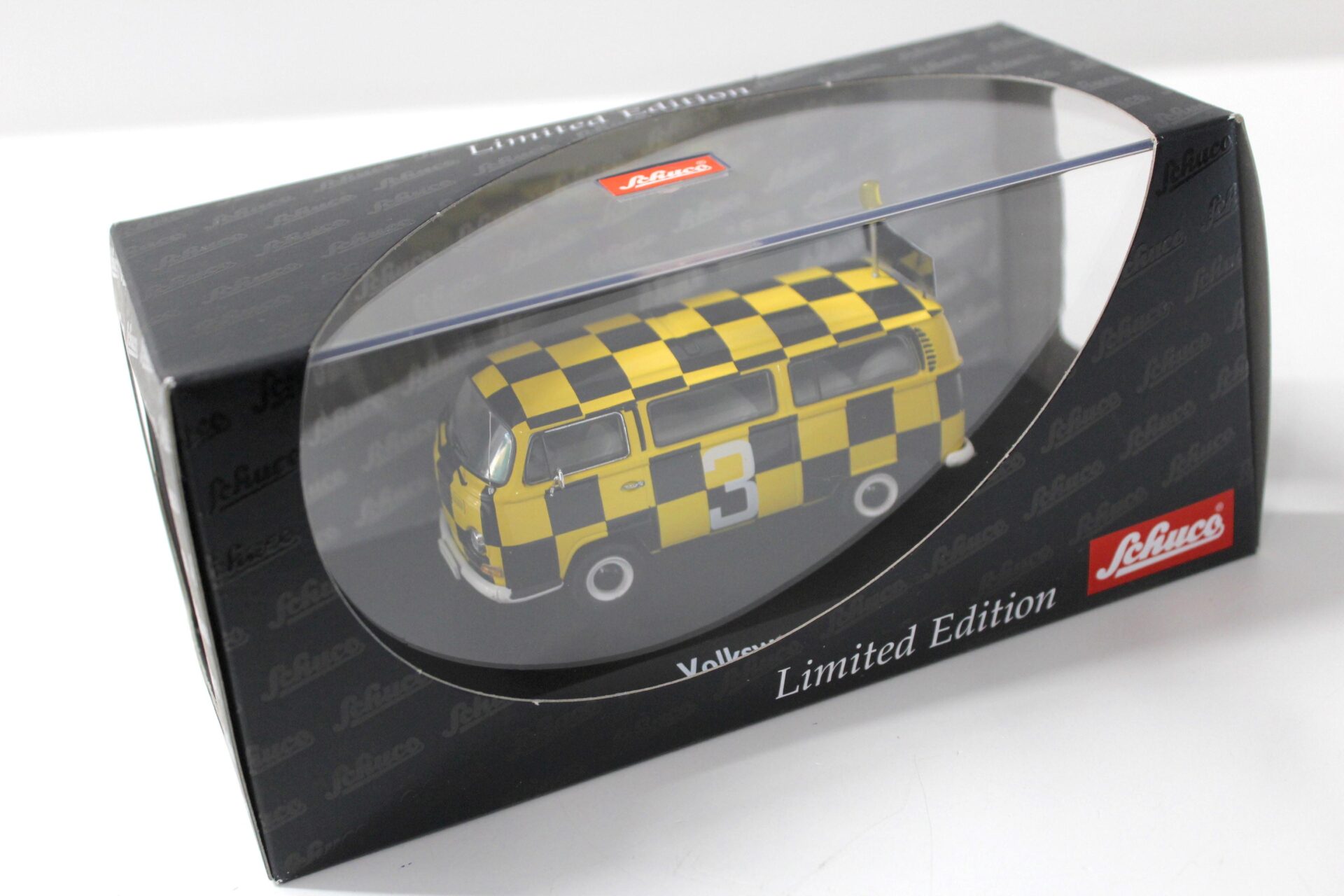 1:43 Schuco VW Bus T2a FOLLOW ME black/ yellow #3
