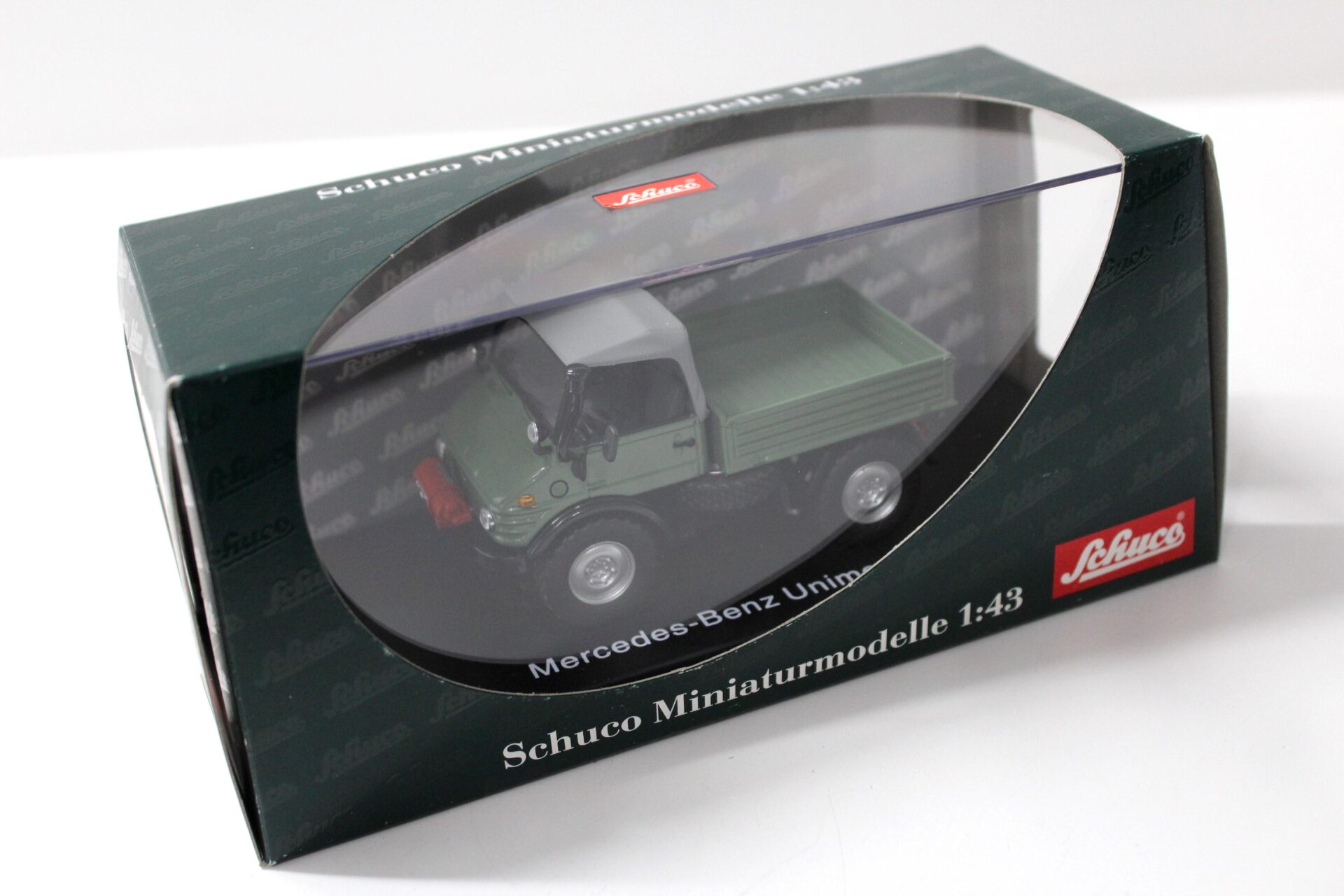 1:43 Schuco Mercedes Unimog 406 green / grey Top