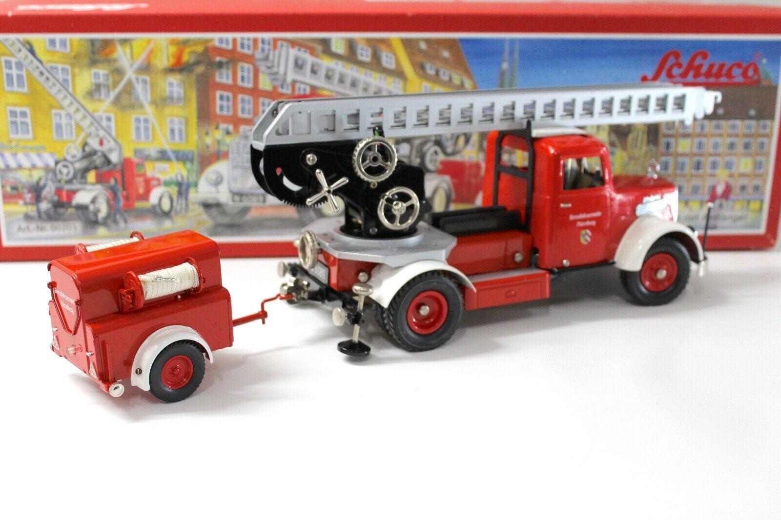 Schuco 00203 Elektro Construction MAN LKW Feuerwehr mit Anhänger red