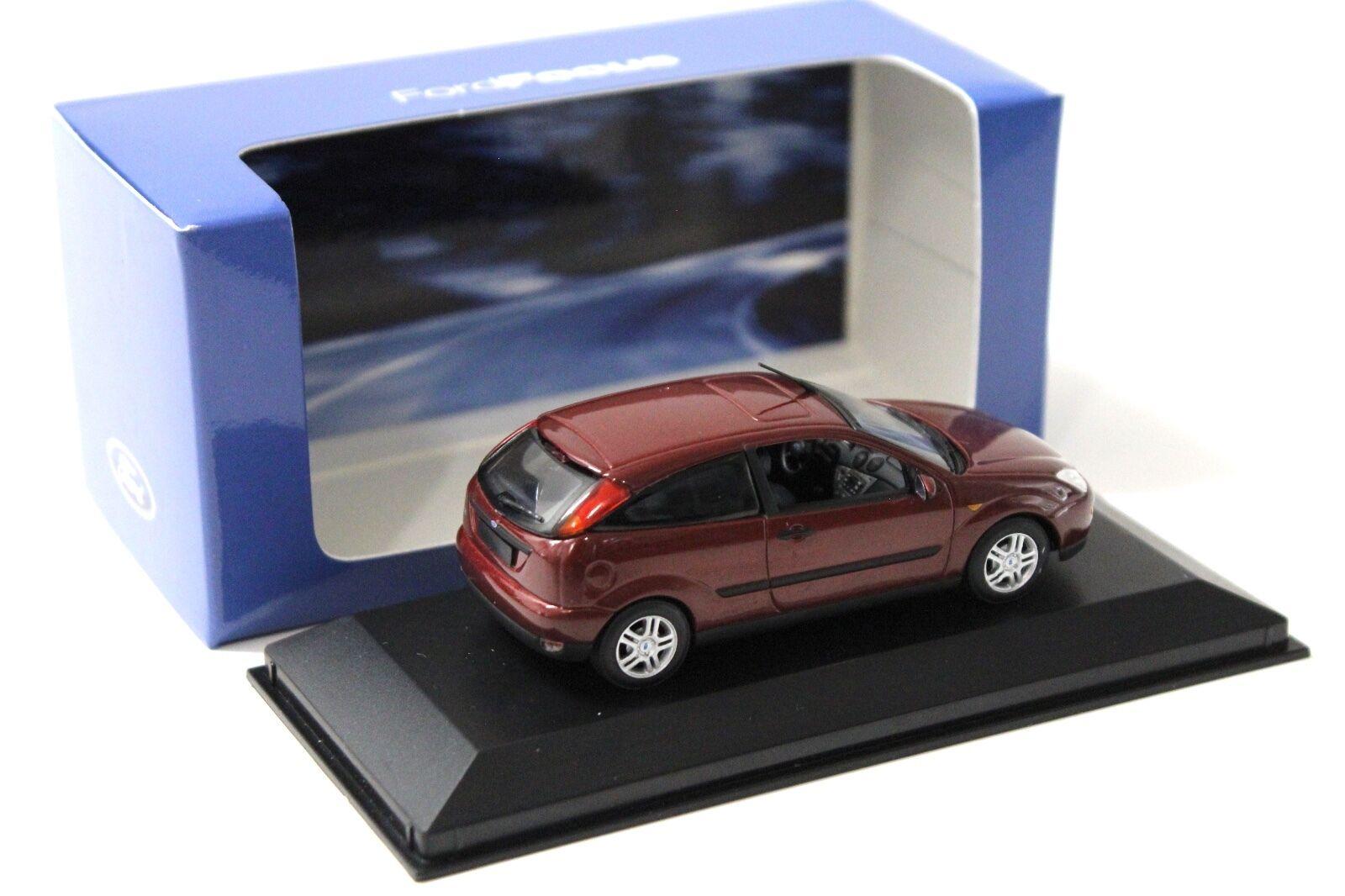 1:43 Minichamps Ford Focus Ghia 1999 dark red DEALER VERSION