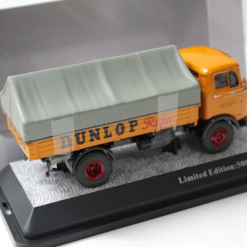 1:43 Premium ClassiXXs Mercedes LP 911 Pritsche/ Plane Dunlop Reifen orange