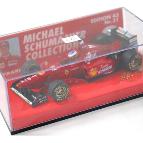 1:43 Minichamps F1 Ferrari F310/2 M.Schumacher #1